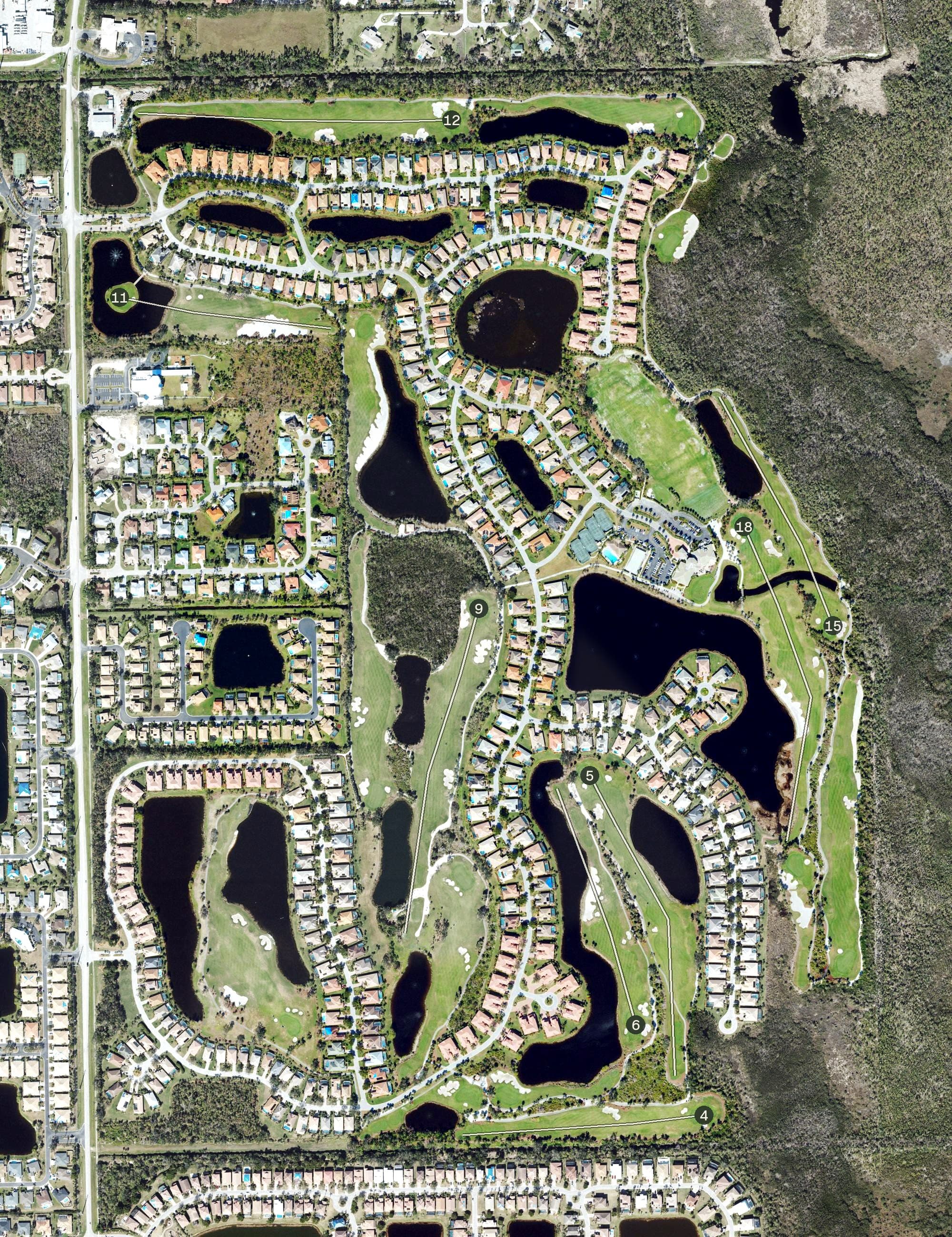 Aerial view of Crown Colony Golf & Country Club, FL, with its hole routing marked