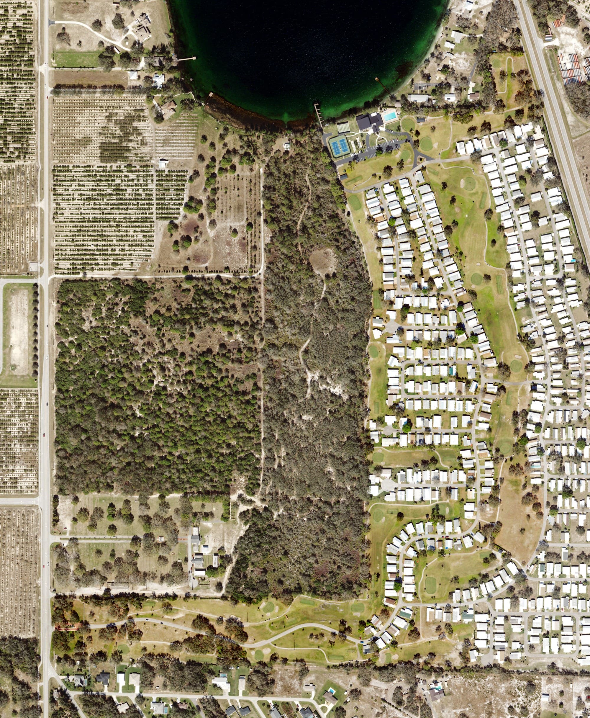 Aerial view of Crystal Lake Club, FL, with its hole routing marked