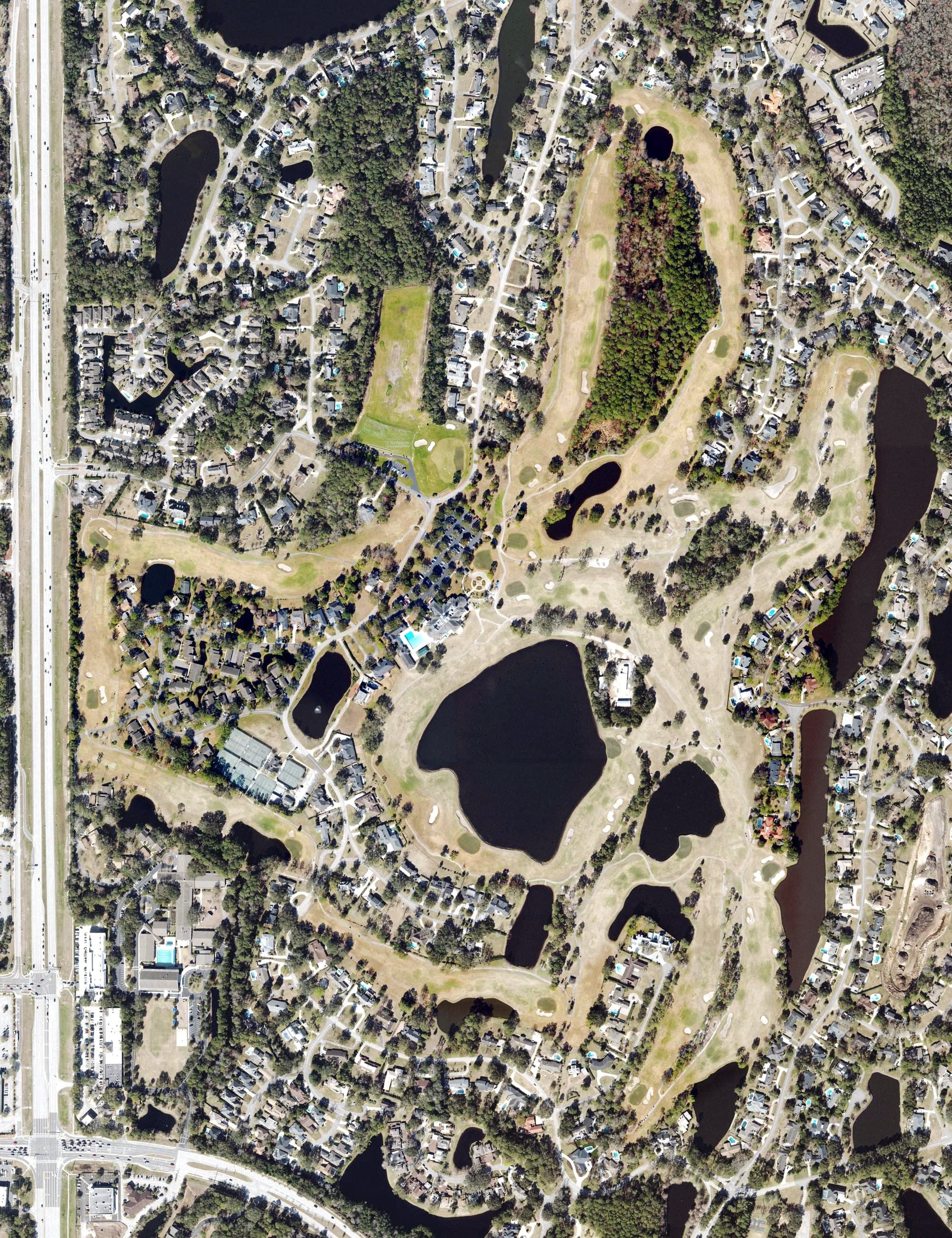 Aerial view of Deerwood Country Club, FL, with its hole routing marked