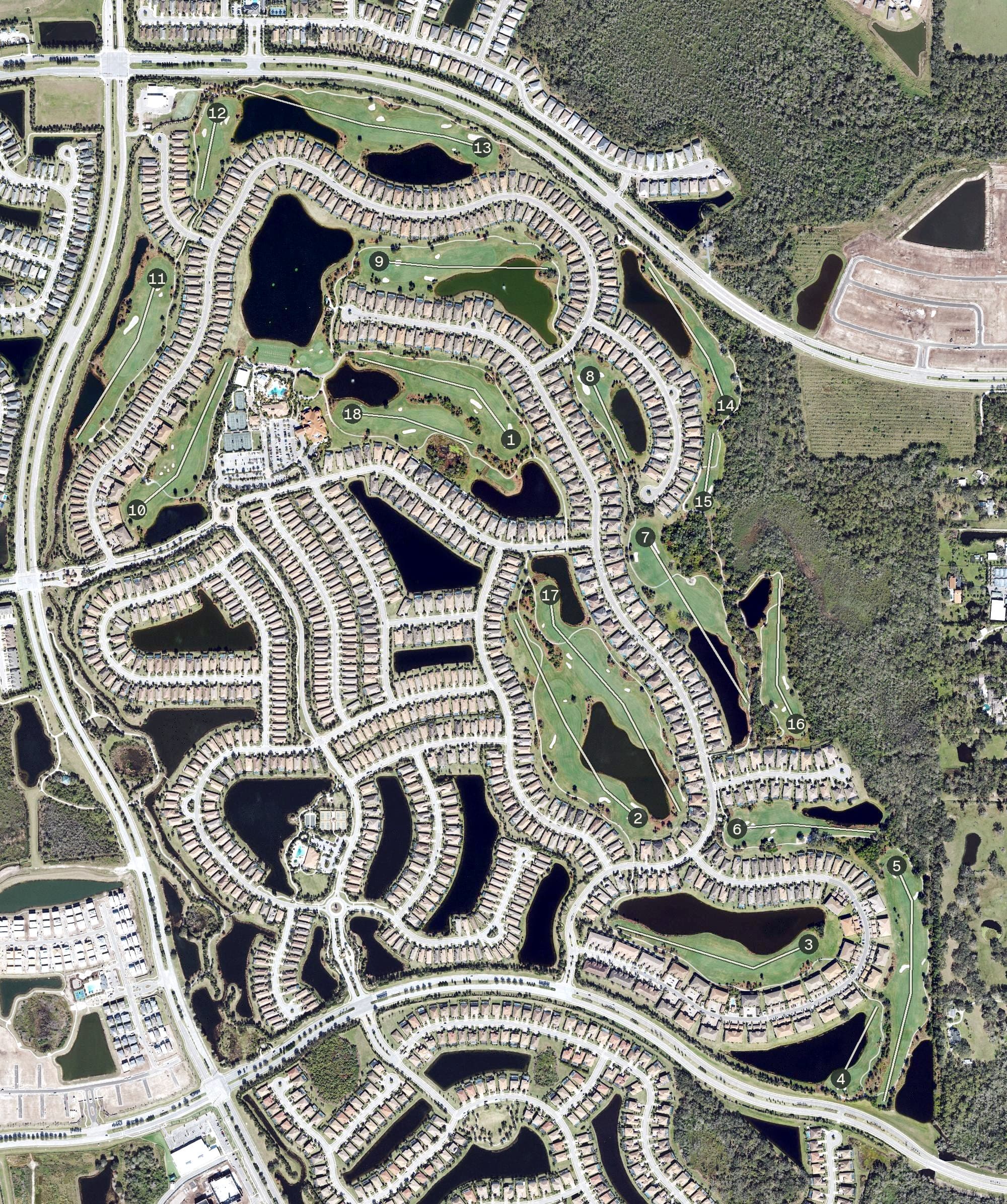 Aerial view of Esplanade Golf & Country Club, FL, with its hole routing marked