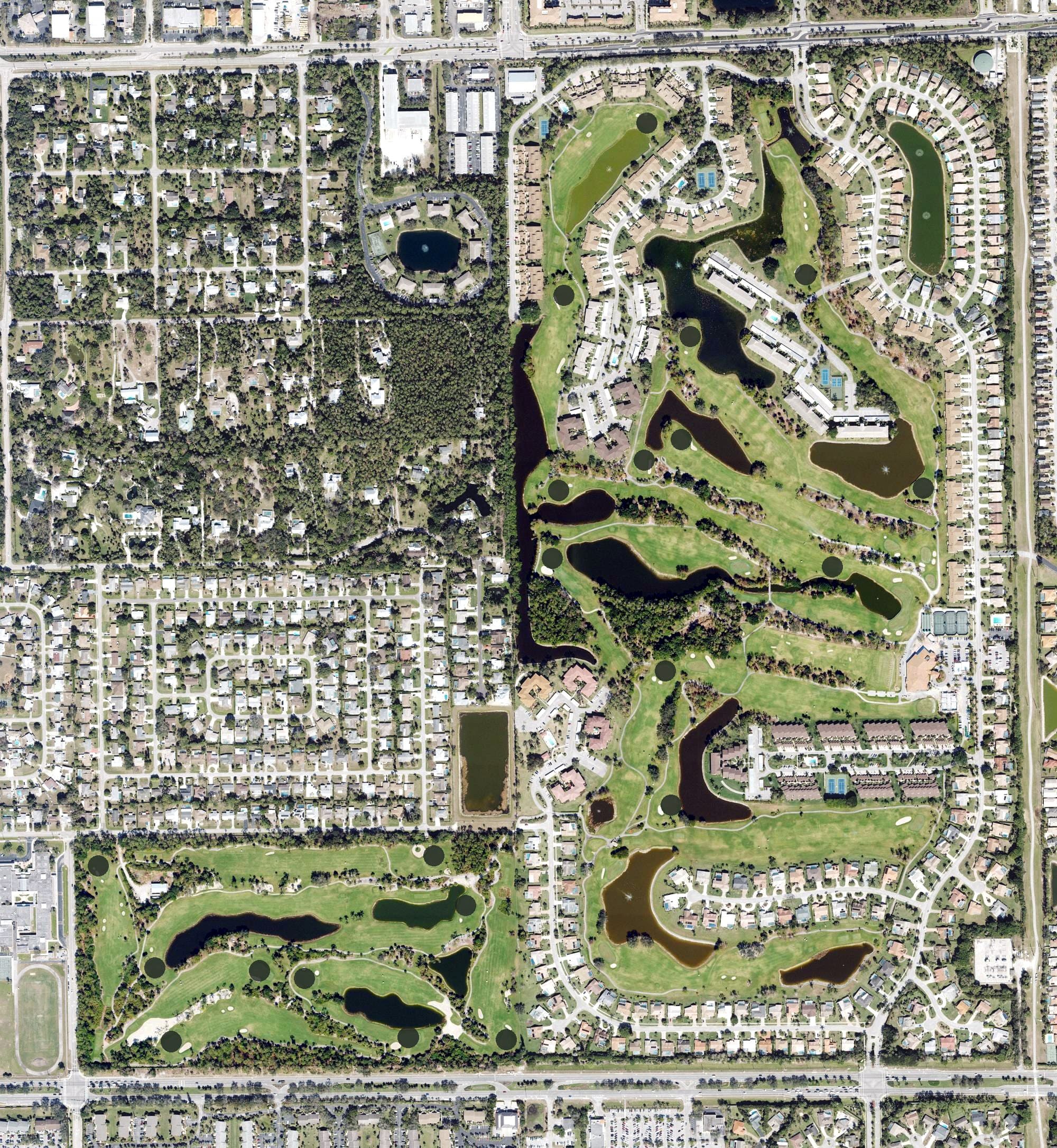 Aerial view of Foxfire Country Club, FL, with its hole routing marked
