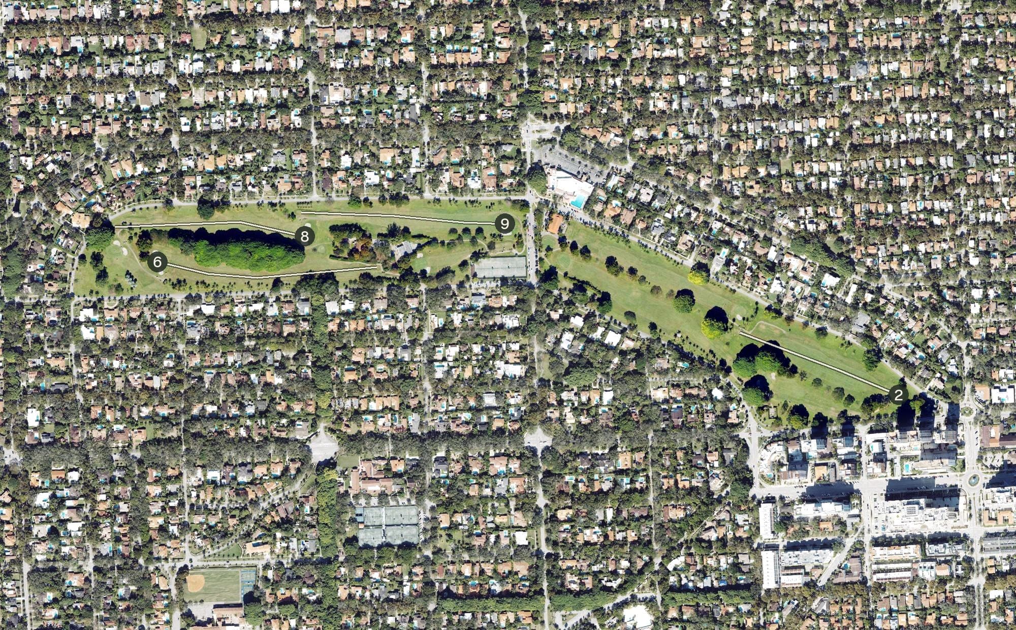 Aerial view of Granada Golf Course, FL, with its hole routing marked