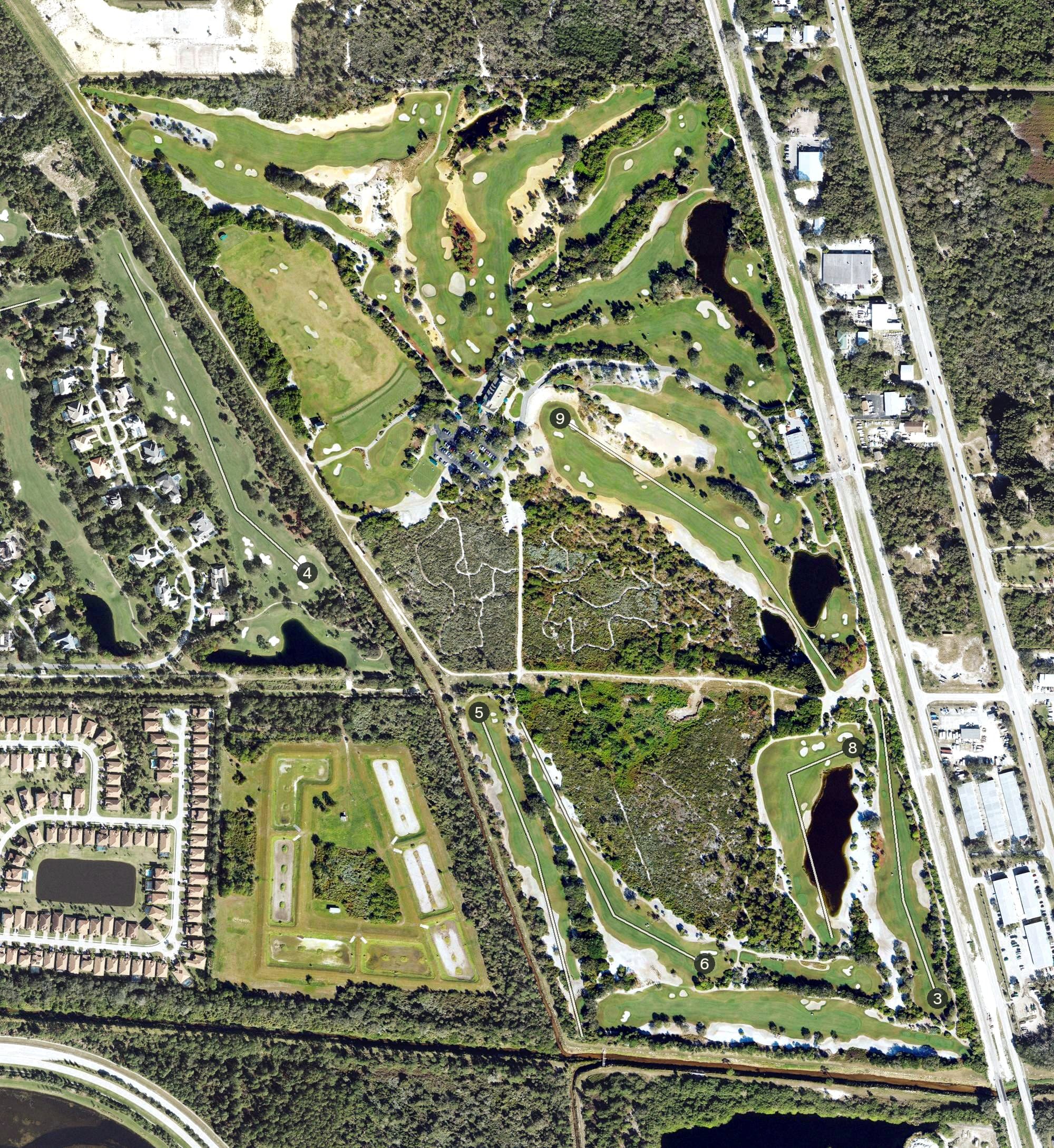 Aerial view of Hawk's Nest Golf Club, FL, with its hole routing marked