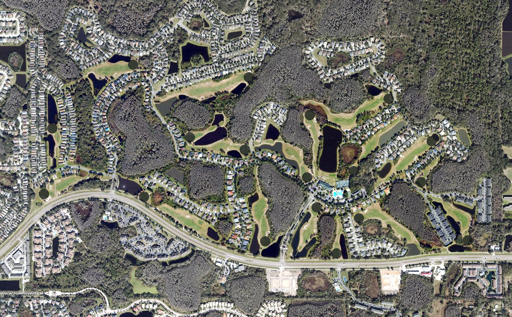 Aerial view of Heritage Isles Golf and Country Club, FL, with its hole routing marked