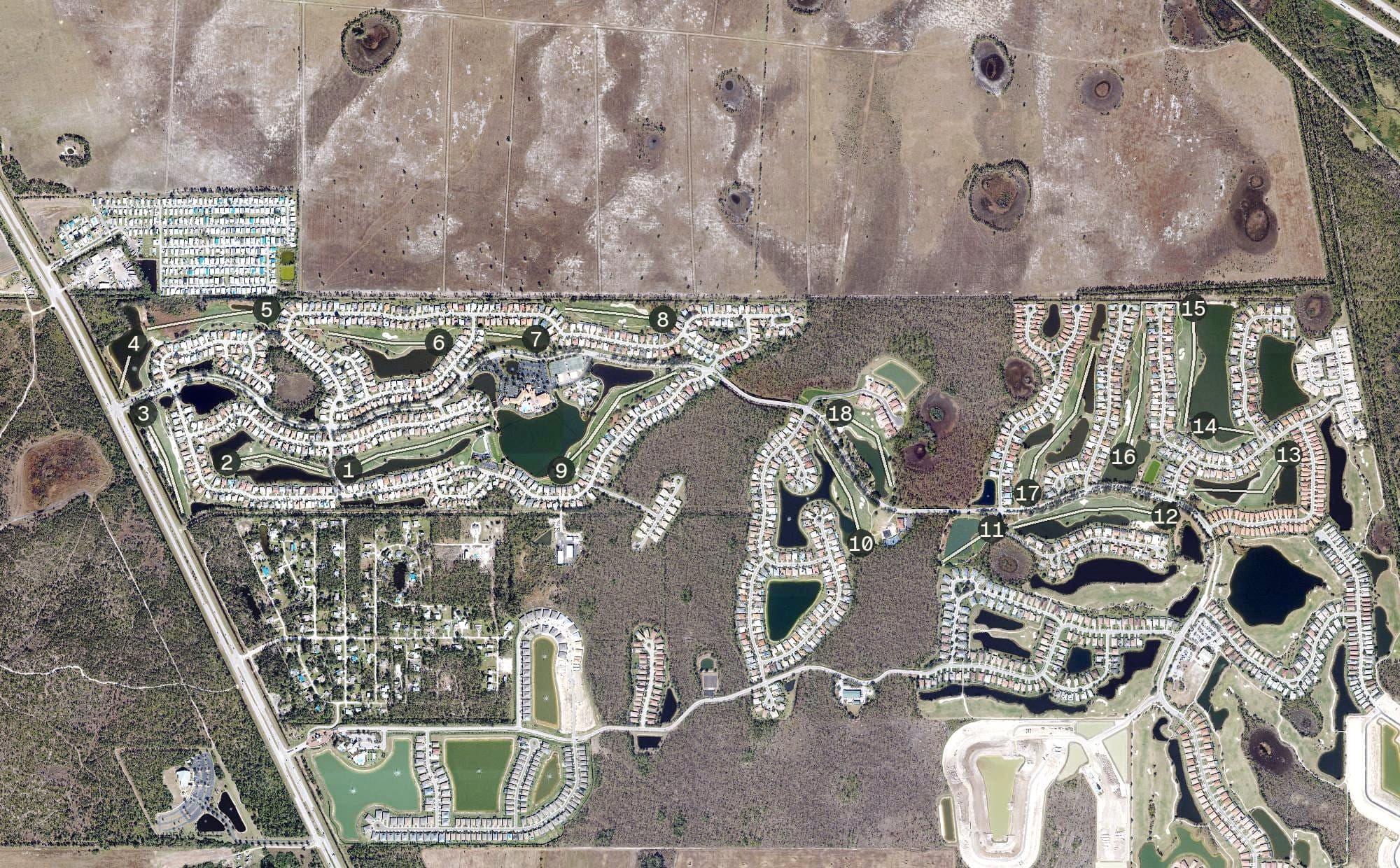 Aerial view of Herons Glen Golf and Country Club, FL, with its hole routing marked