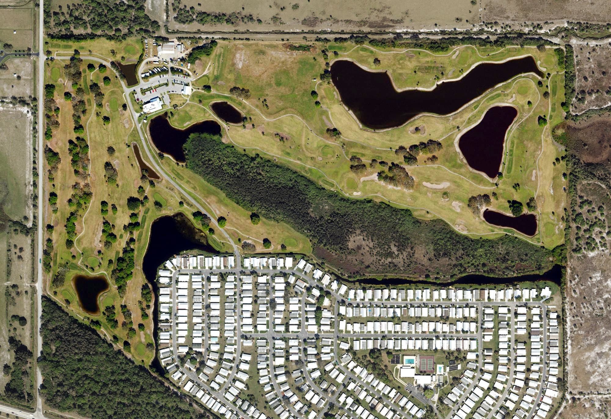 Aerial view of Indianwood Golf & Country Club, FL, with its hole routing marked