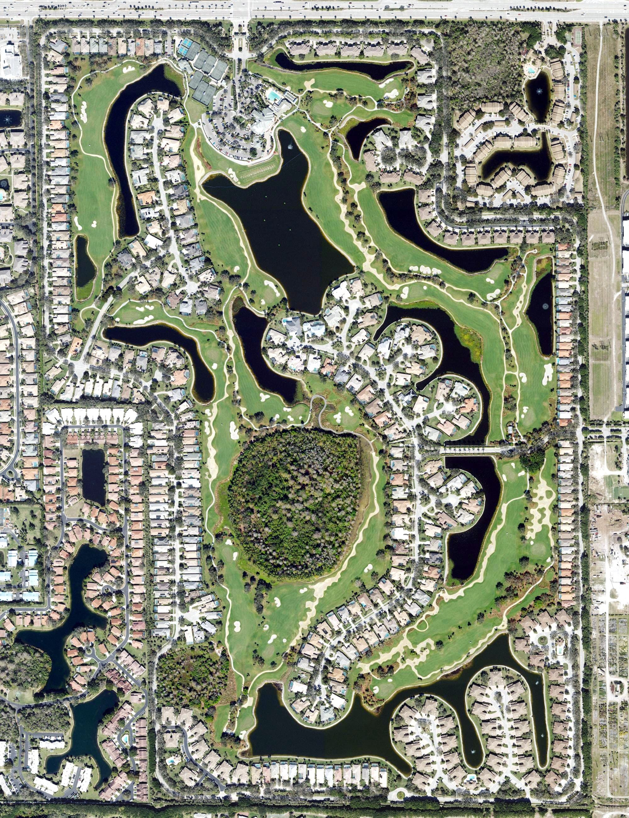 Aerial view of Kensington Golf & Country Club, FL, with its hole routing marked