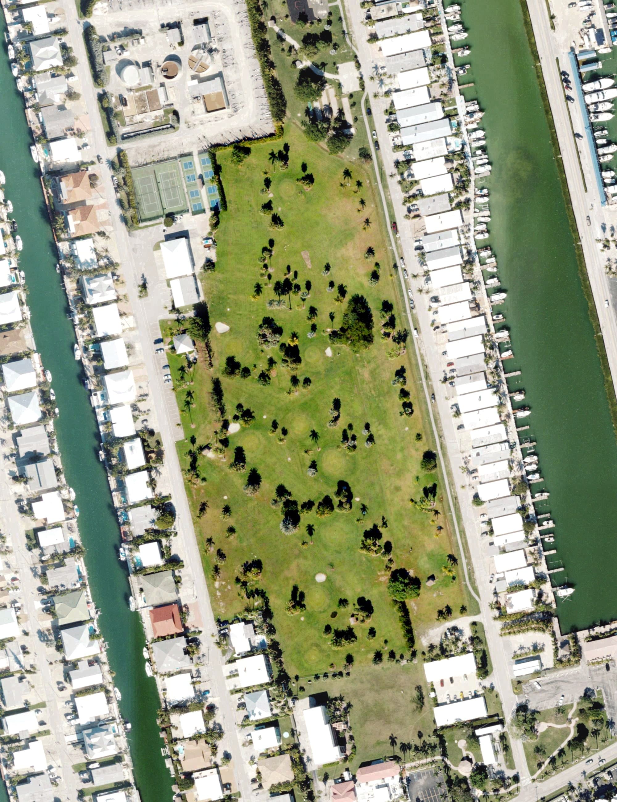Aerial view of Key Colony Beach Golf, FL, with its hole routing marked