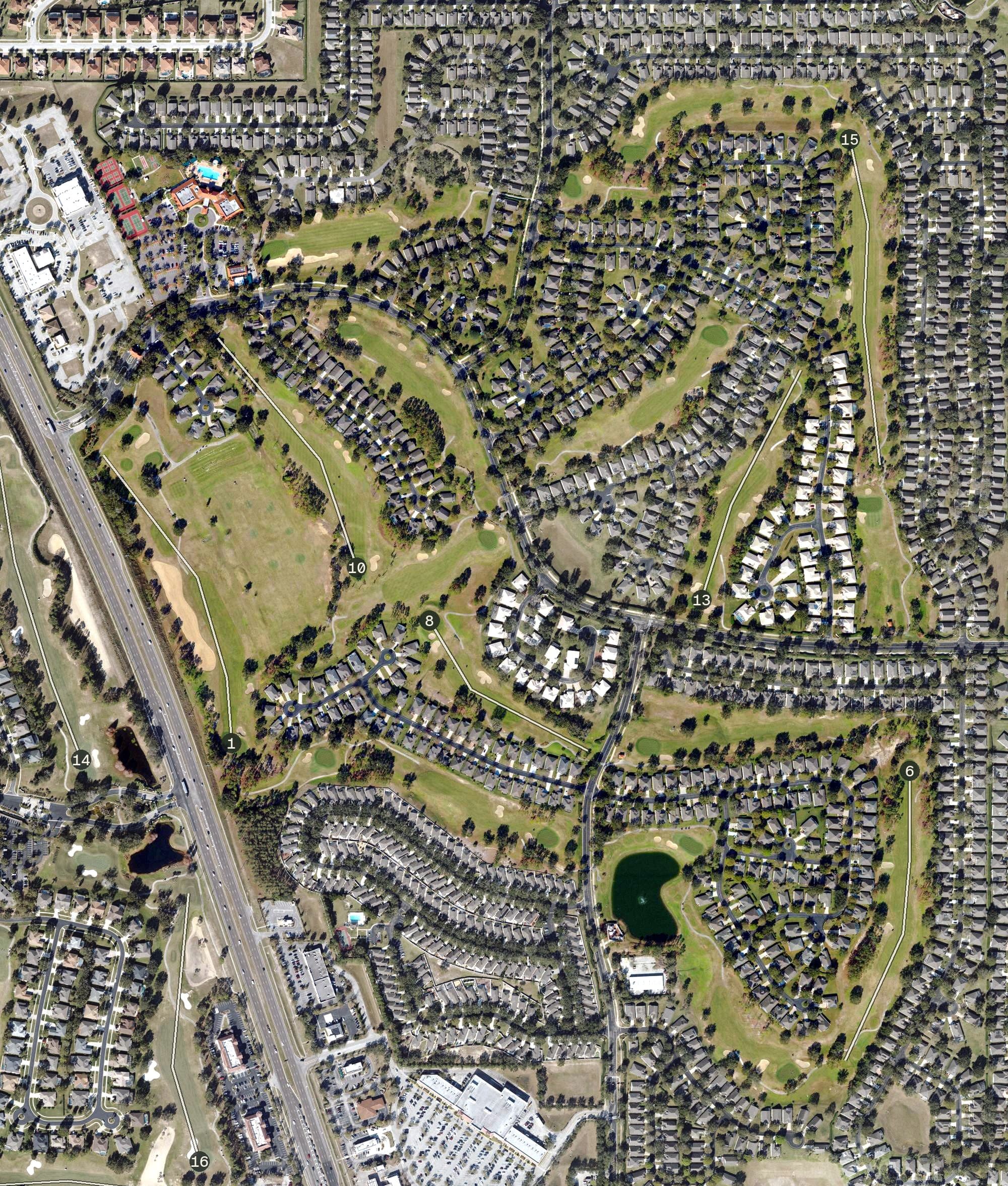 Aerial view of Kings Ridge Golf Club, FL, with its hole routing marked