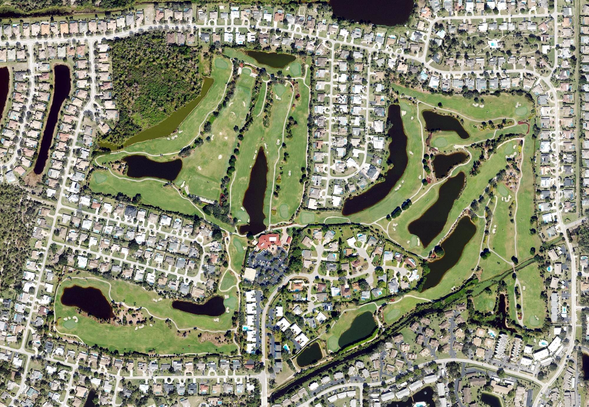 Aerial view of LaPlaya Golf Club, FL, with its hole routing marked