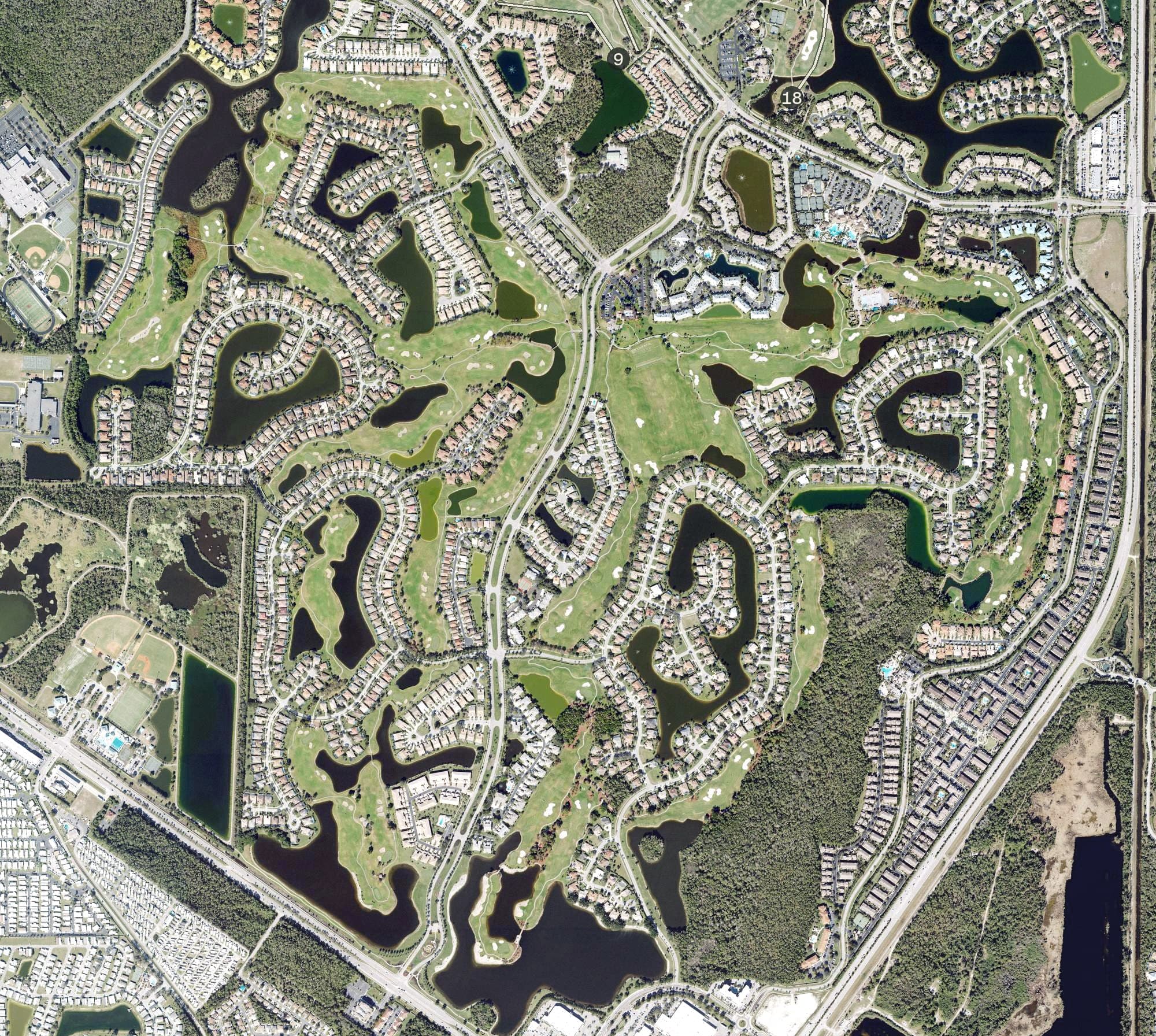 Aerial view of Lely Resort Golf And Country Club, FL, with its hole routing marked