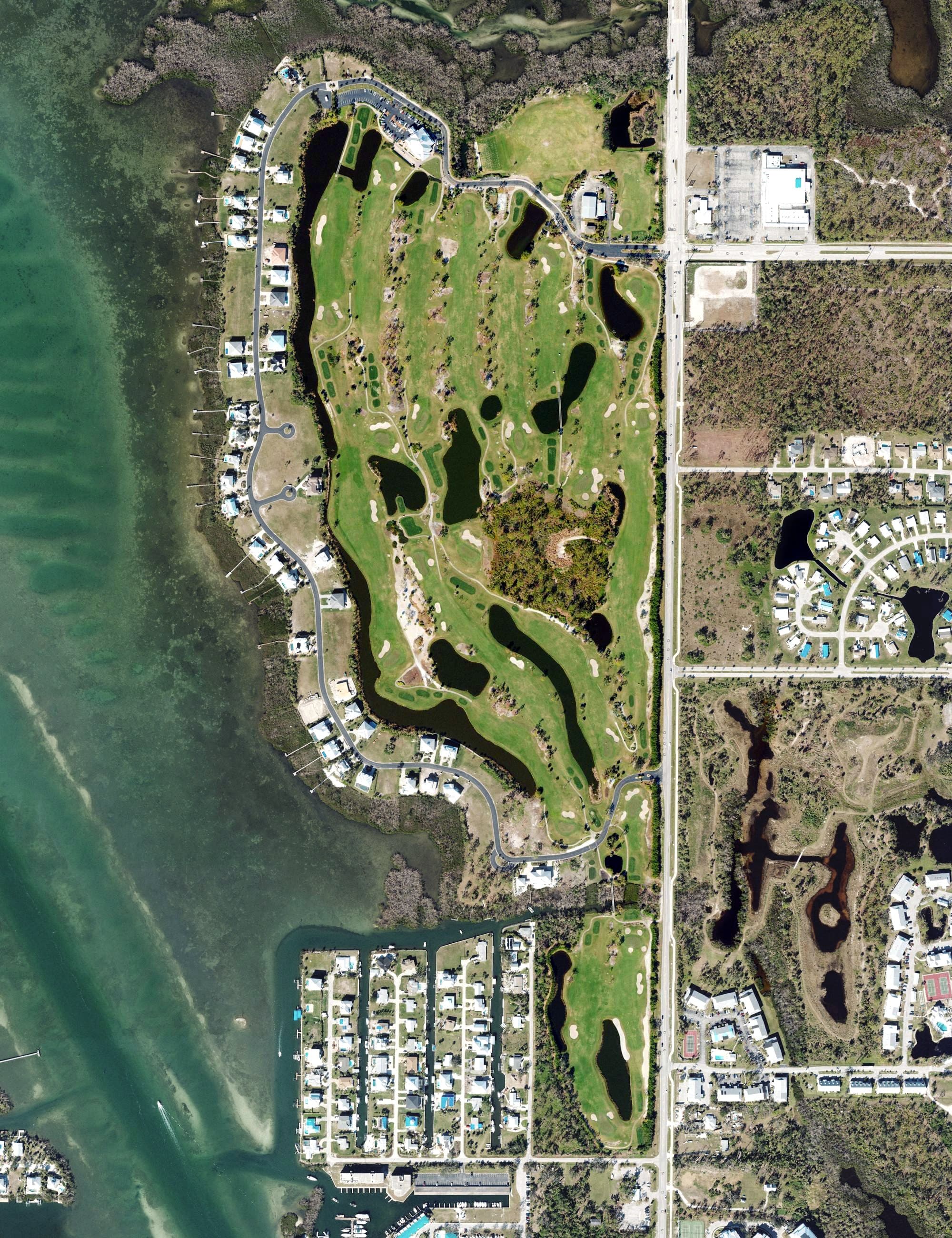 Aerial view of Lemon Bay Golf Club, FL, with its hole routing marked