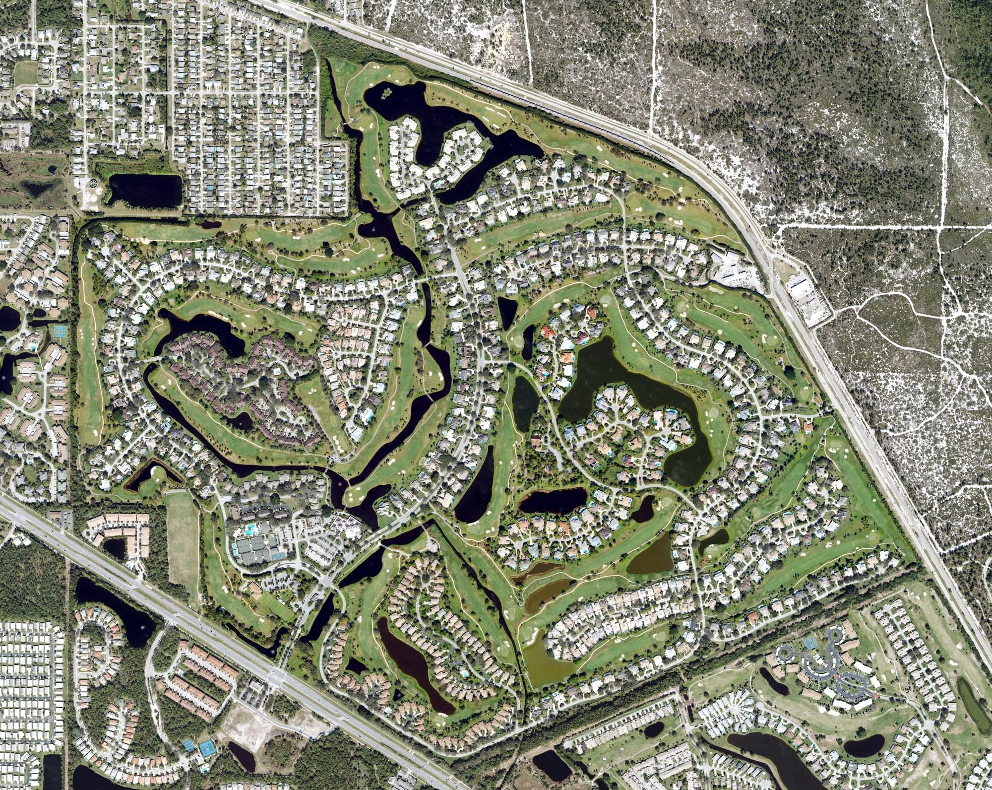 Aerial view of Mariner Sands Golf & Country Club, FL, with its hole routing marked