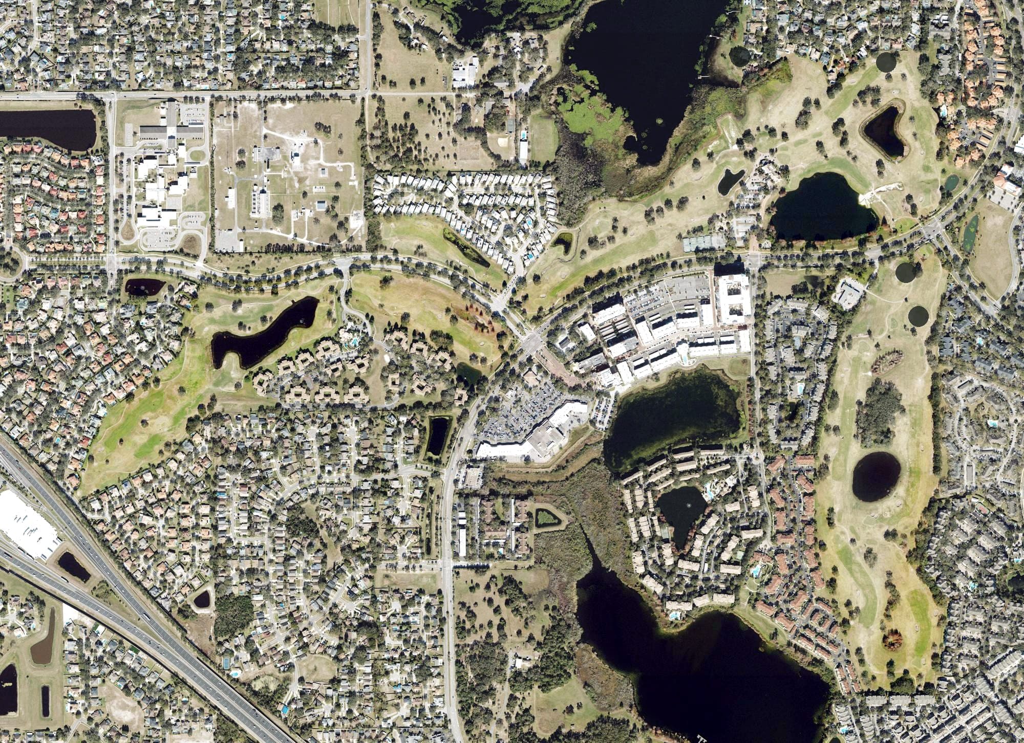 Aerial view of MetroWest Golf Club, FL, with its hole routing marked
