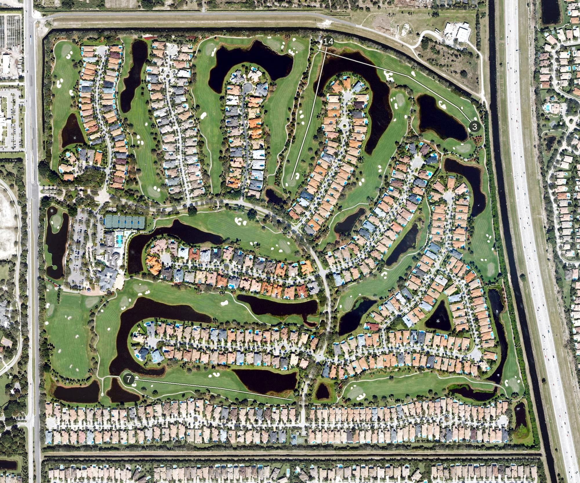 Aerial view of Mizner Country Club, FL, with its hole routing marked