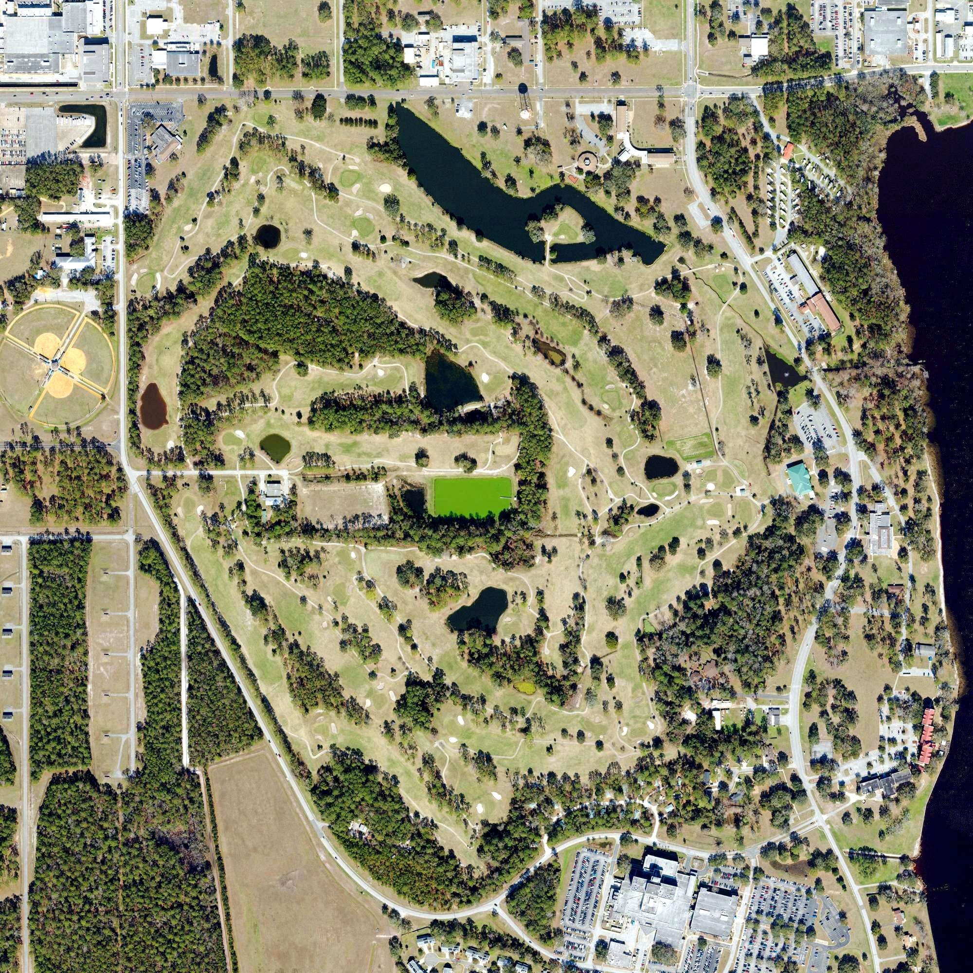 Aerial view of Naval Air Station Jacksonville Golf Course, FL, with its hole routing marked