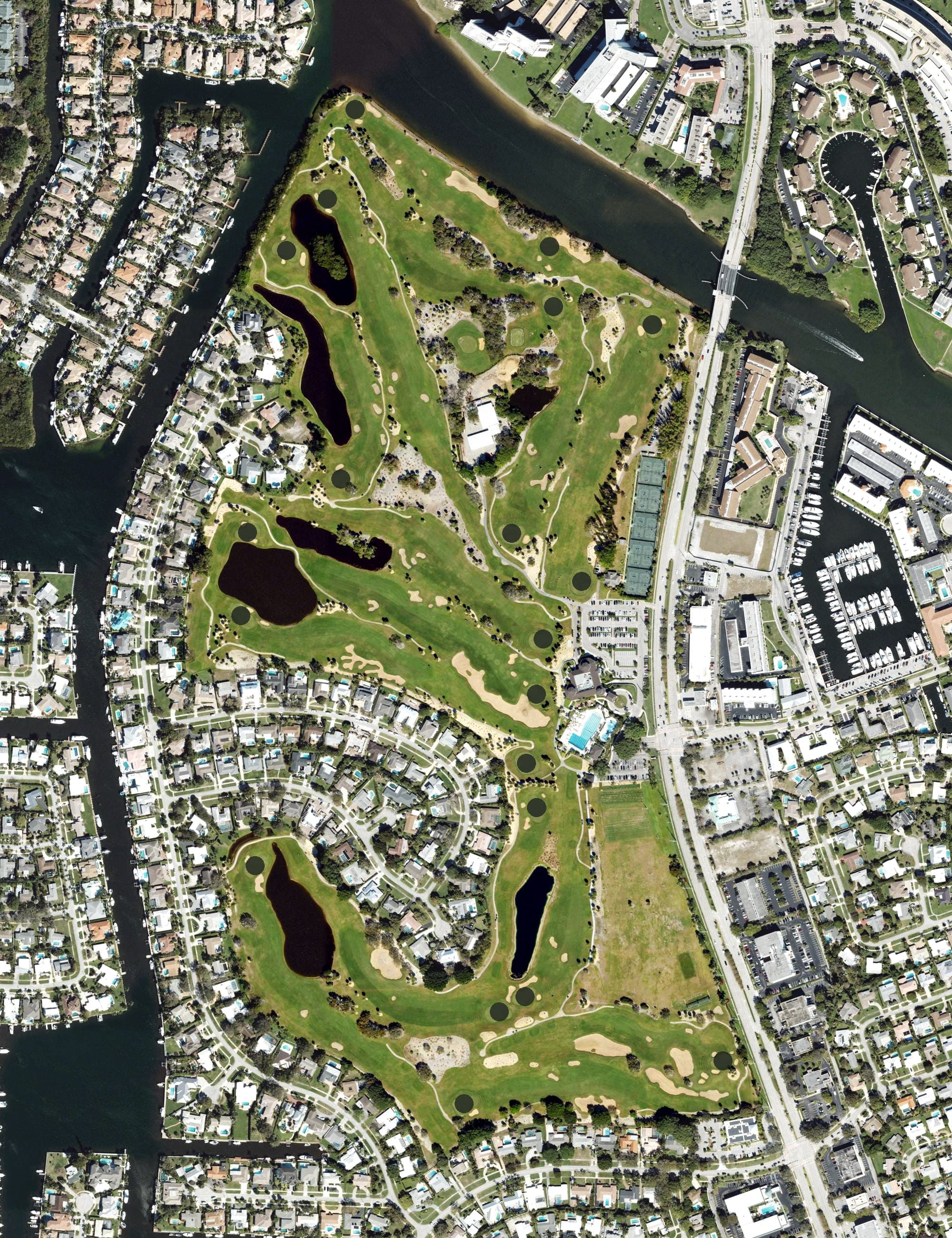 Aerial view of North Palm Beach Country Club Golf Course, FL, with its hole routing marked