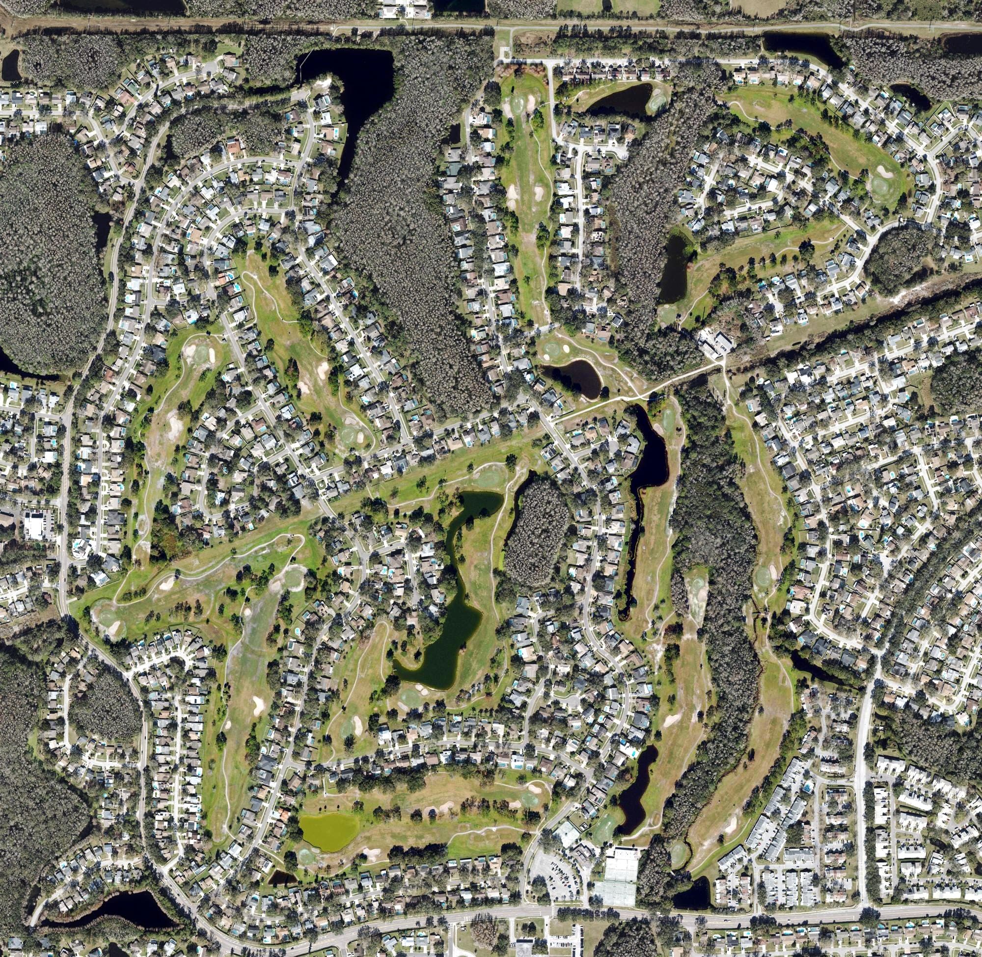 Aerial view of Northdale Golf & Tennis Club, FL, with its hole routing marked