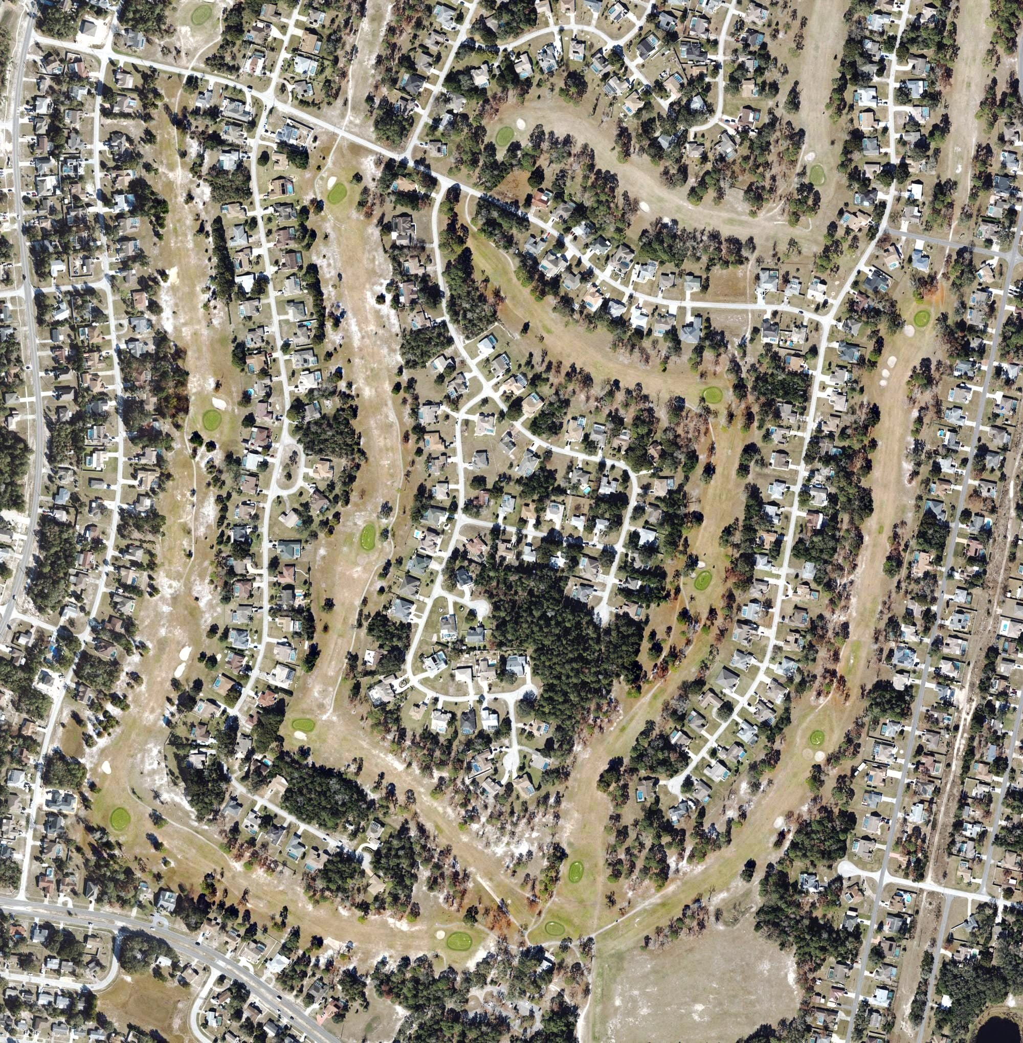 Aerial view of Oak Hills Golf Club, FL, with its hole routing marked
