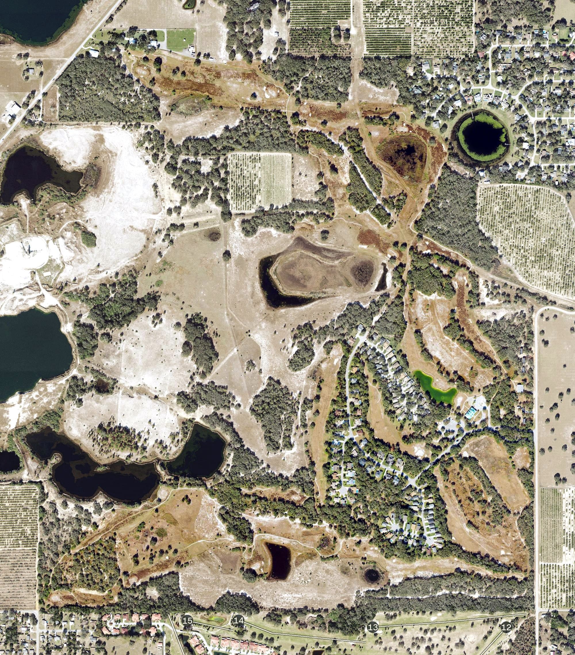Aerial view of Oakwood Golf Club, FL, with its hole routing marked