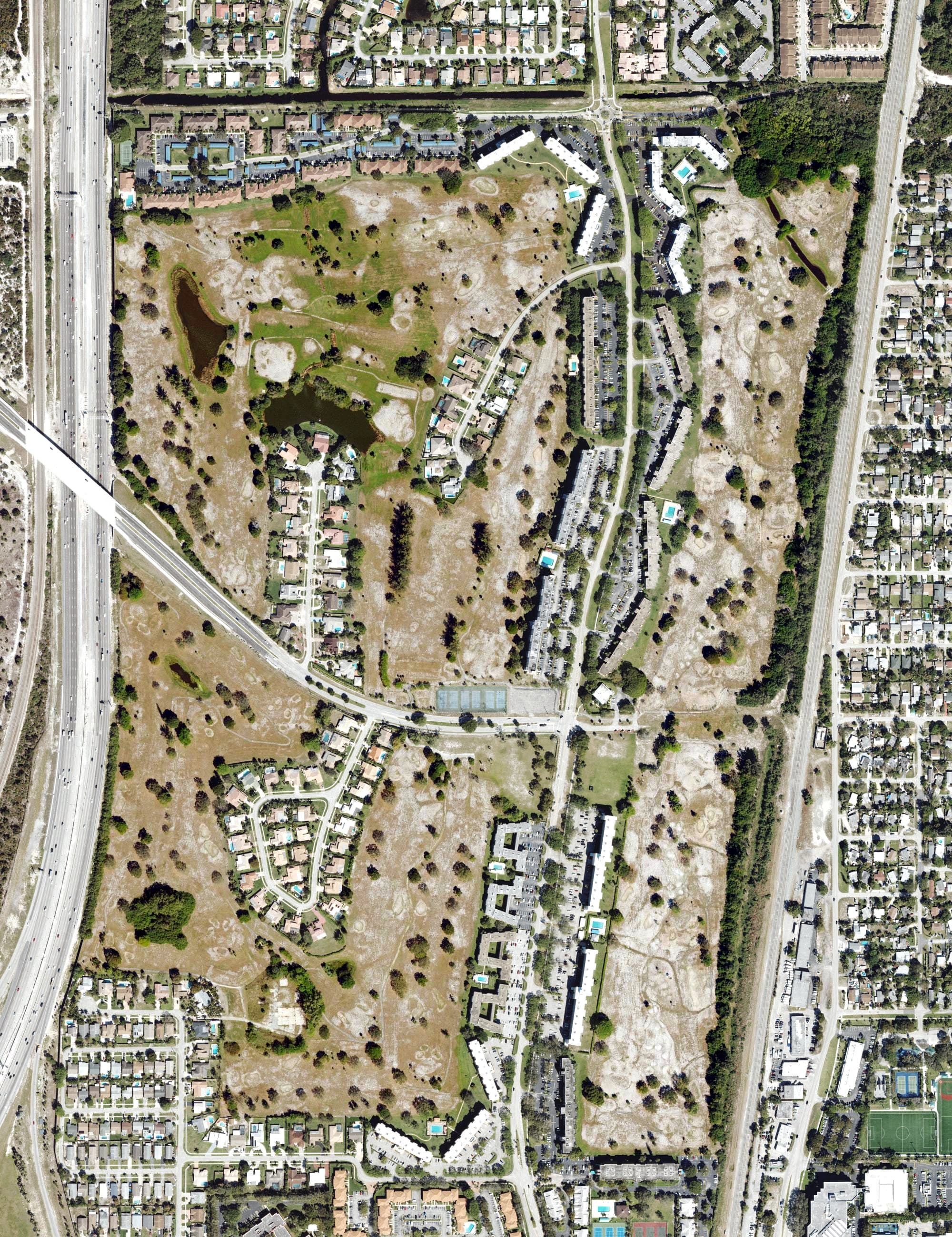 Aerial view of Ocean Breeze Golf & Country Club, FL, with its hole routing marked
