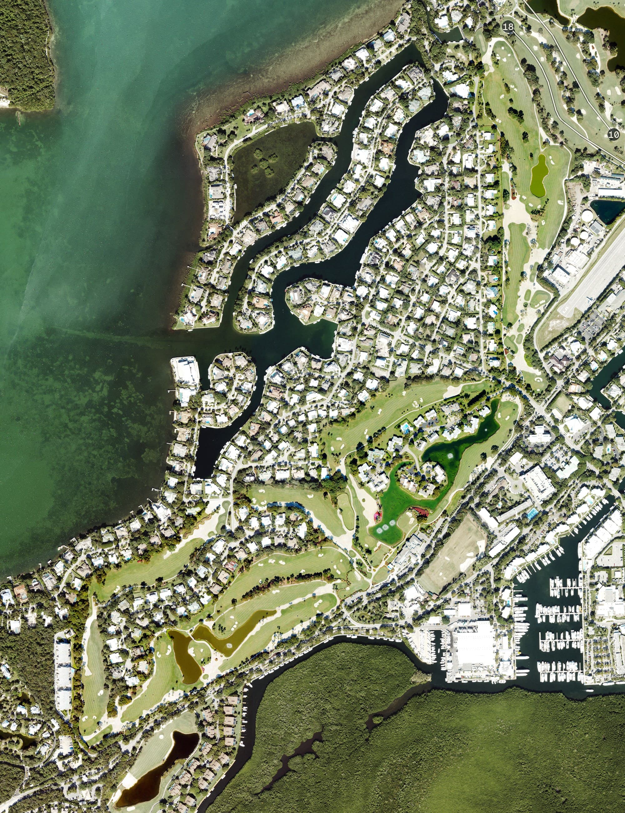 Aerial view of Ocean Reef - Dolphone Course, FL, with its hole routing marked