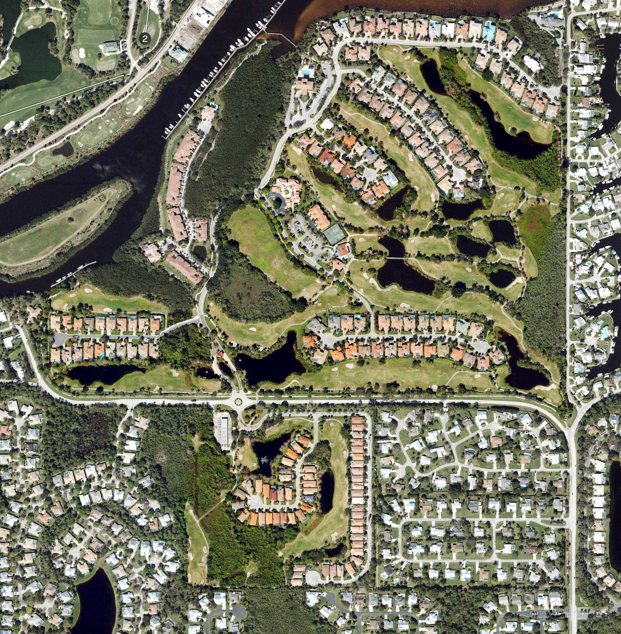 Aerial view of Palm Cove Golf & Yacht Club, FL, with its hole routing marked