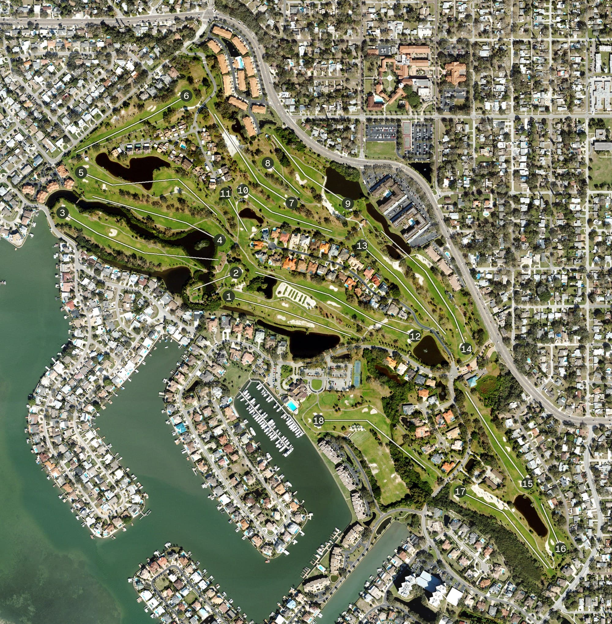 Aerial view of Pasadena Yacht & Country Club Golf, FL, with its hole routing marked