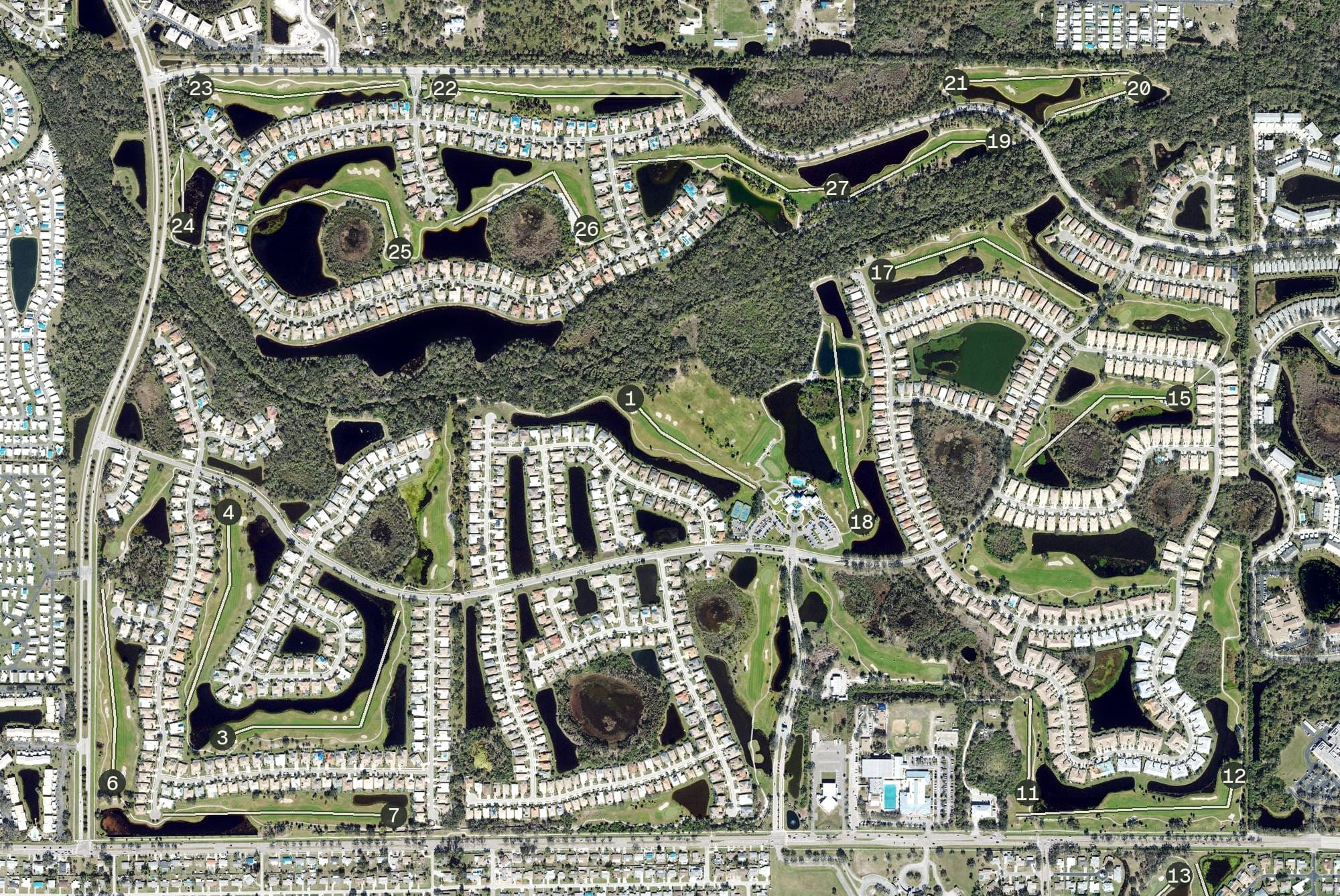 Aerial view of Pelican Pointe Golf & Country Club, FL, with its hole routing marked