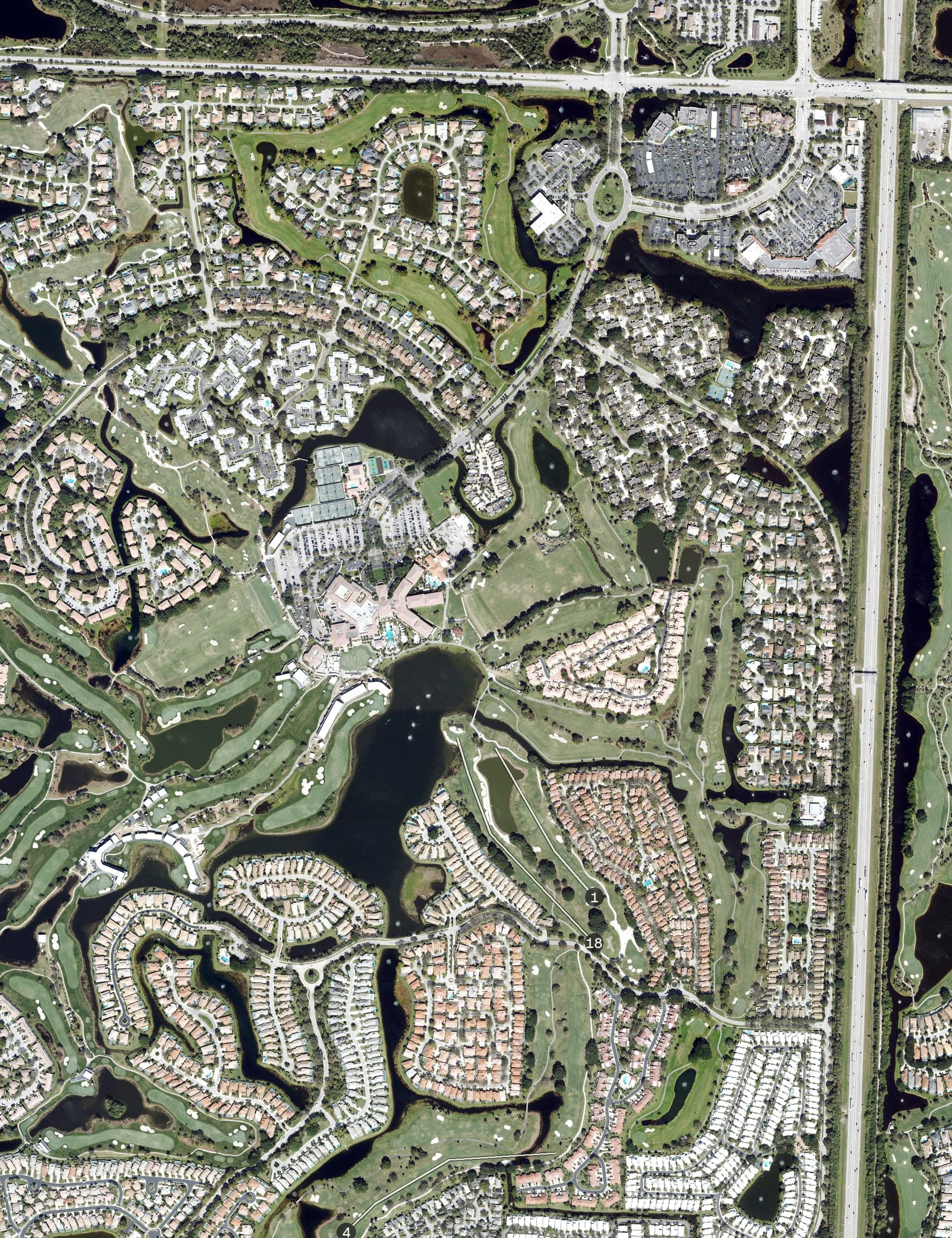Aerial view of PGA National Resort Fazio course, FL, with its hole routing marked