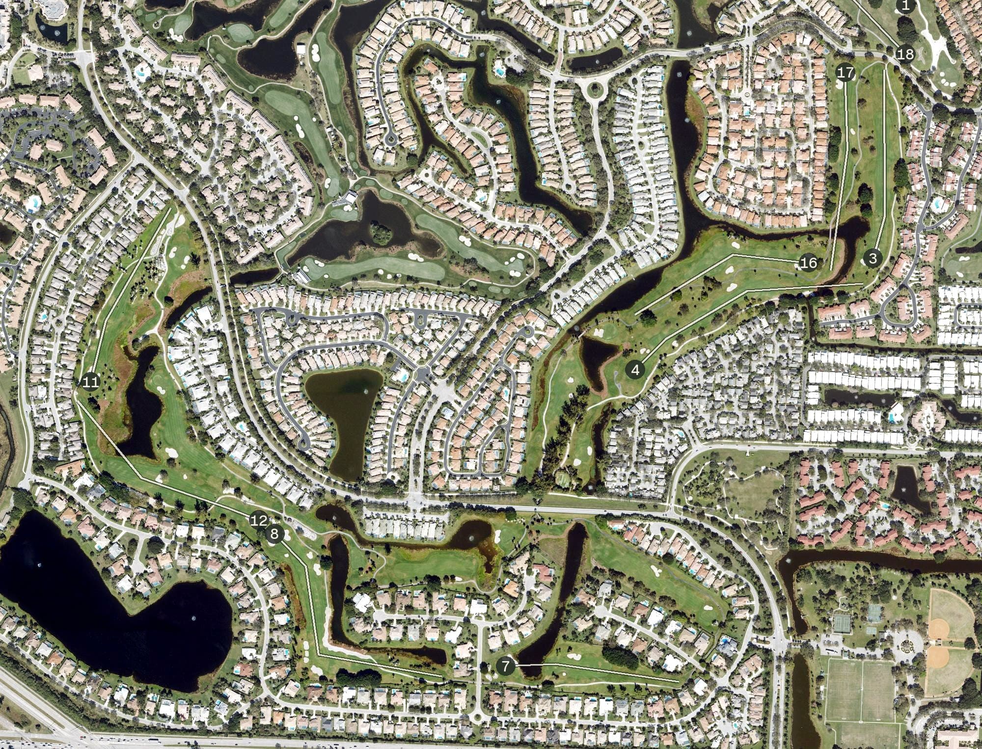 Aerial view of PGA National Resort Palmer course, FL, with its hole routing marked