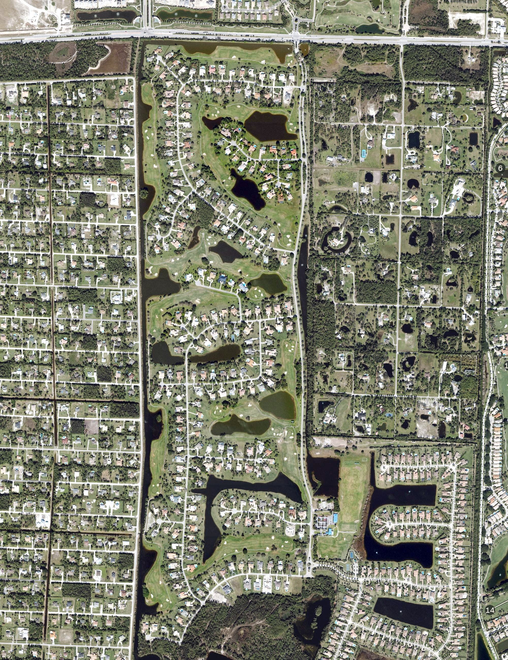 Aerial view of PGA The Estates, FL, with its hole routing marked