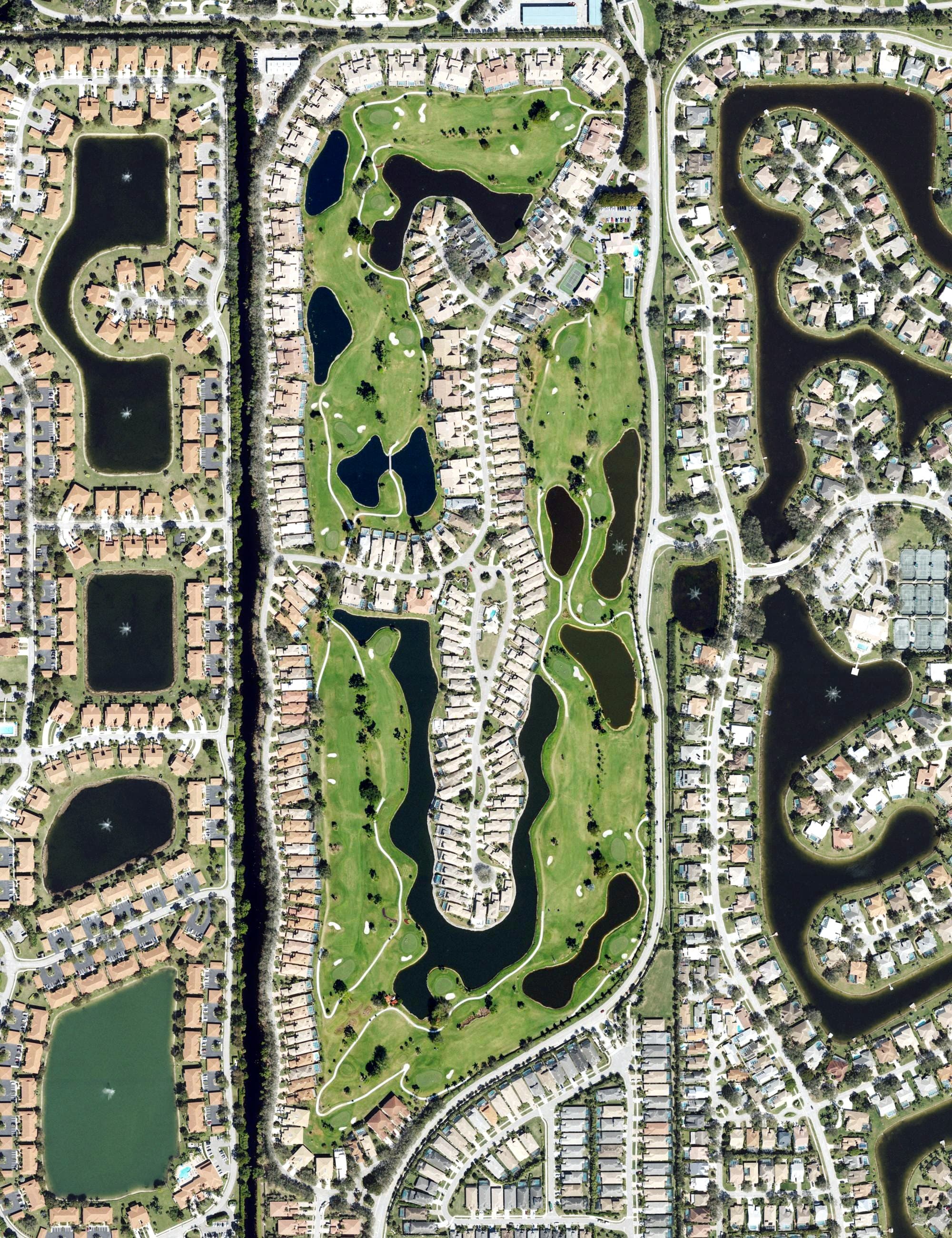 Aerial view of Quail Creek Village Golf Club, FL, with its hole routing marked