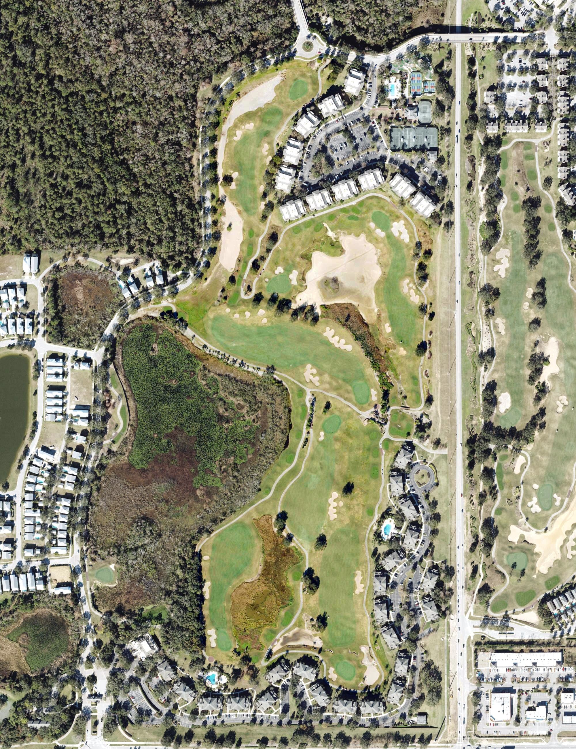 Aerial view of Reunion Resort Golf Course, FL, with its hole routing marked