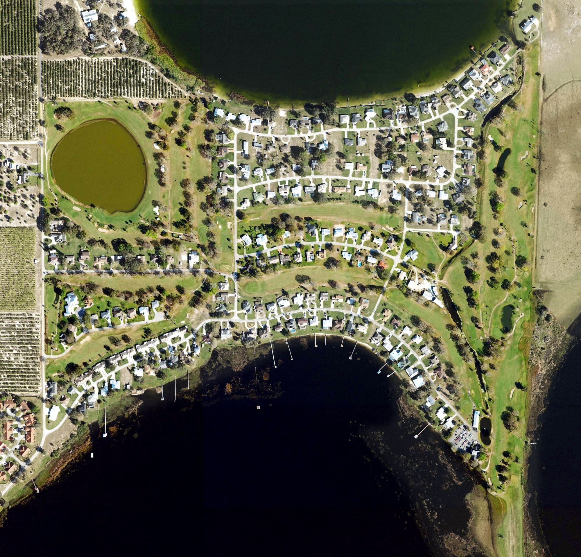 Aerial view of River Greens Golf Course, FL, with its hole routing marked