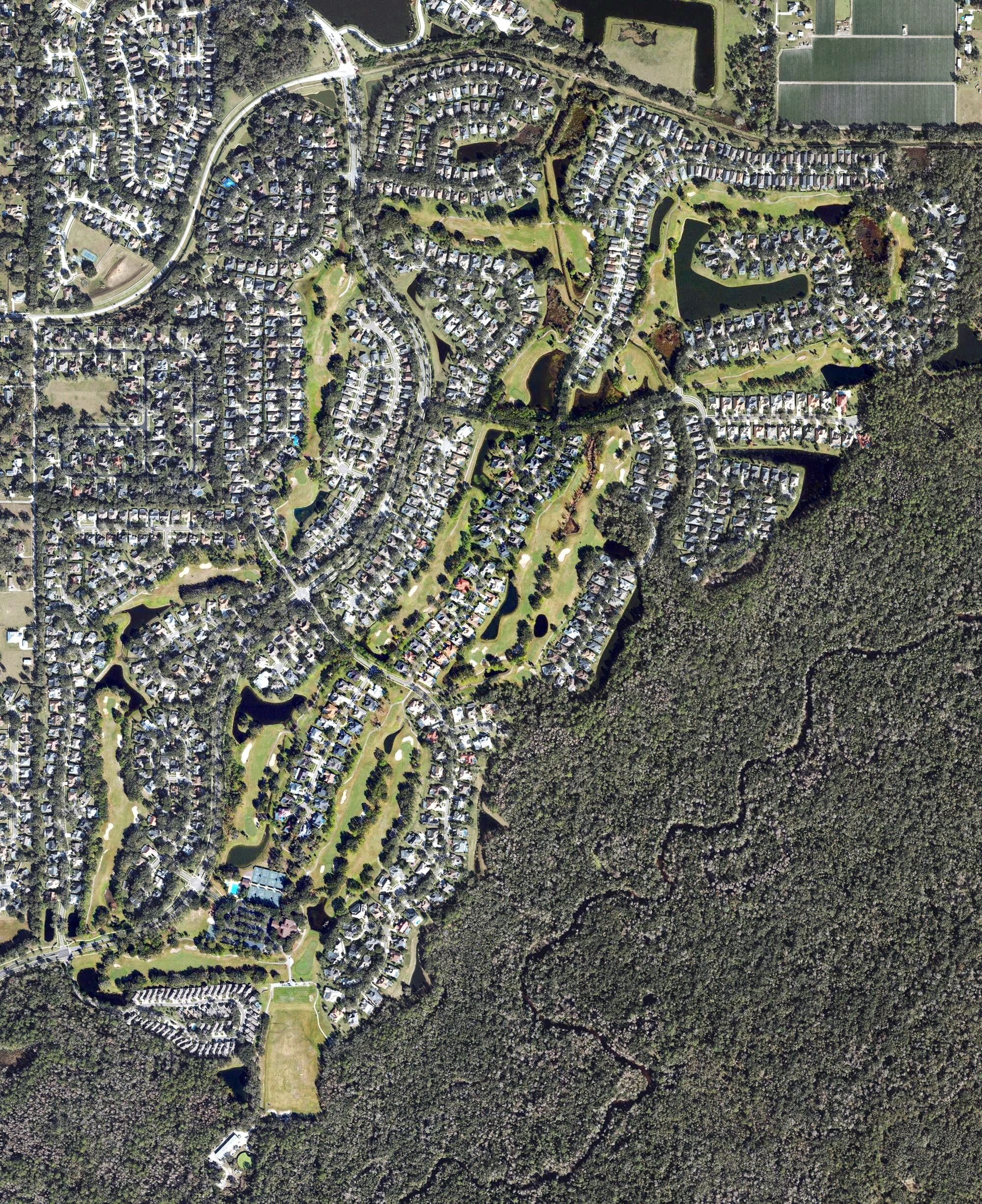 Aerial view of River Hills golf course and country club, FL, with its hole routing marked