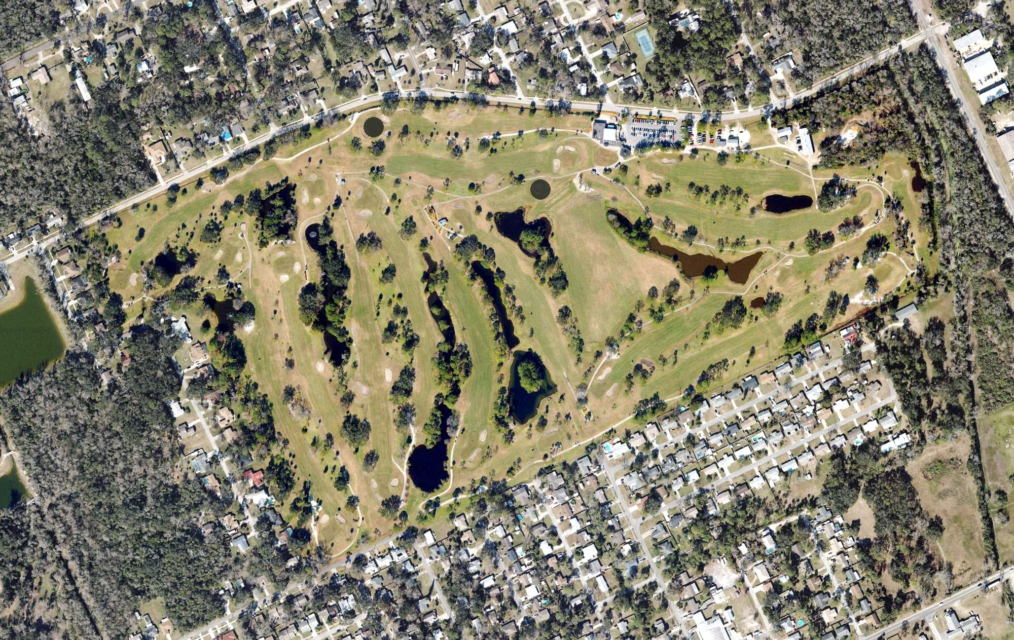 Aerial view of Riviera Country Club (Ormond Beach), FL, with its hole routing marked