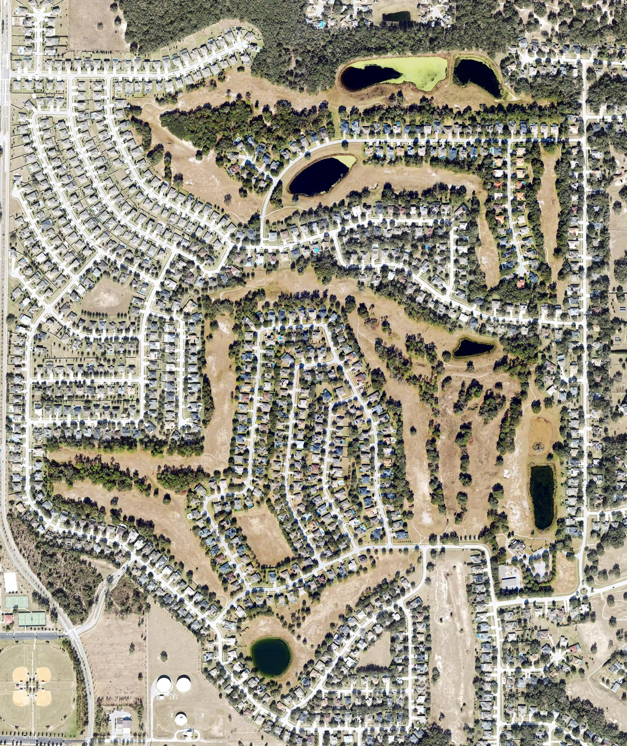 Aerial view of Rock Springs Ridge Golf Club, FL, with its hole routing marked