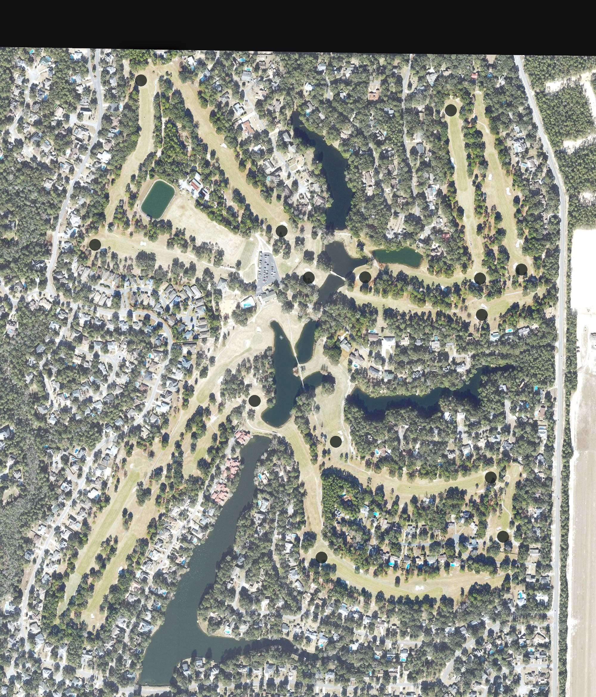 Aerial view of Rocky Bayou Country Club, FL, with its hole routing marked