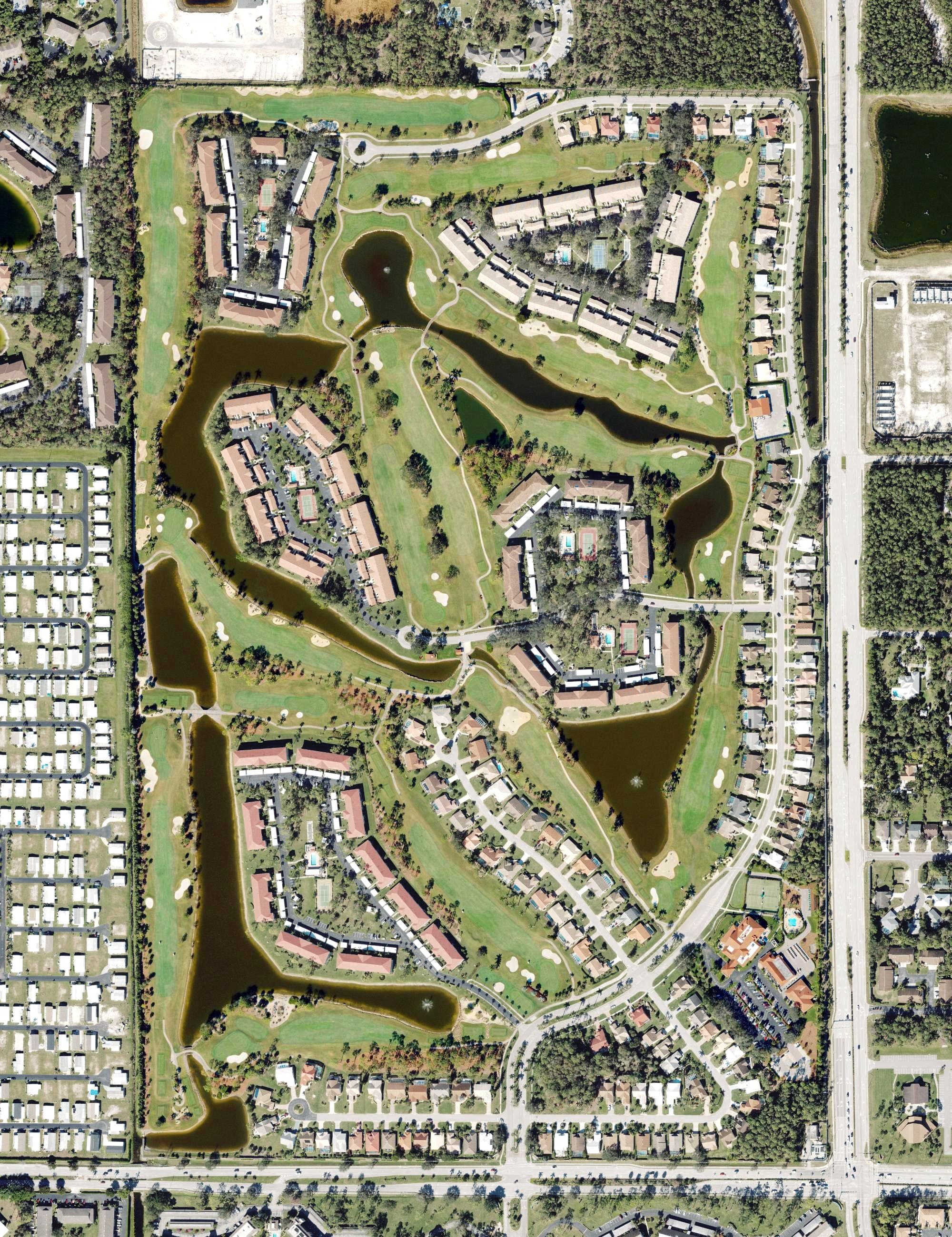 Aerial view of Royal Wood Golf & Country Club, FL, with its hole routing marked
