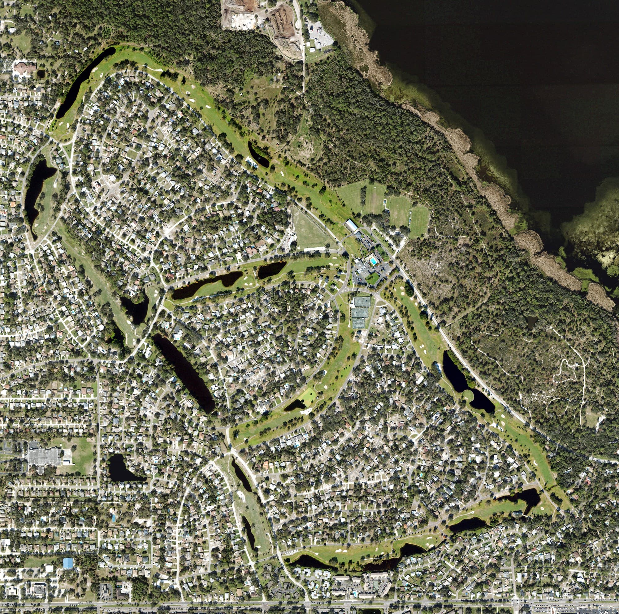 Aerial view of Saint Petersburg Country Club, FL, with its hole routing marked
