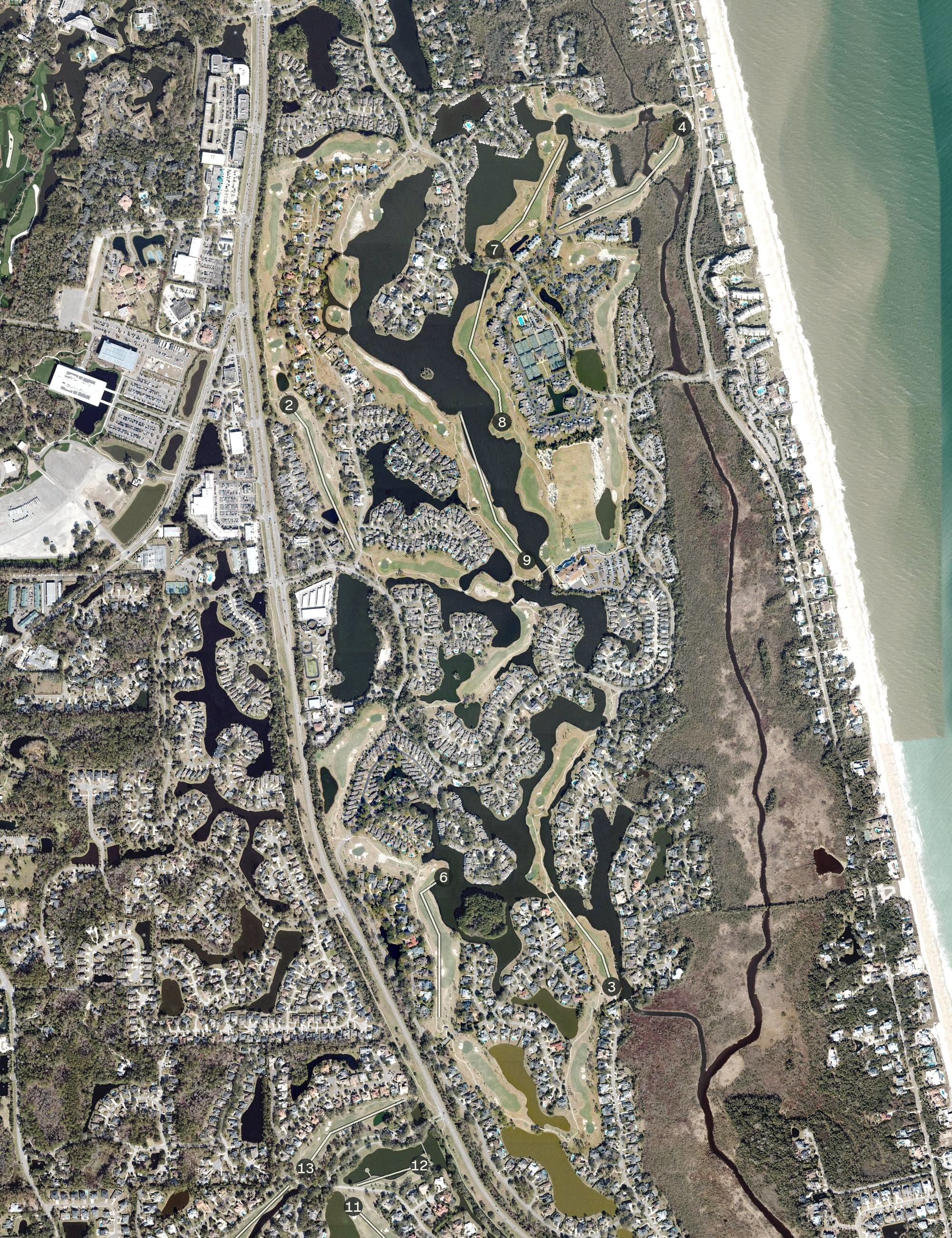 Aerial view of Sawgrass Country Club, FL, with its hole routing marked