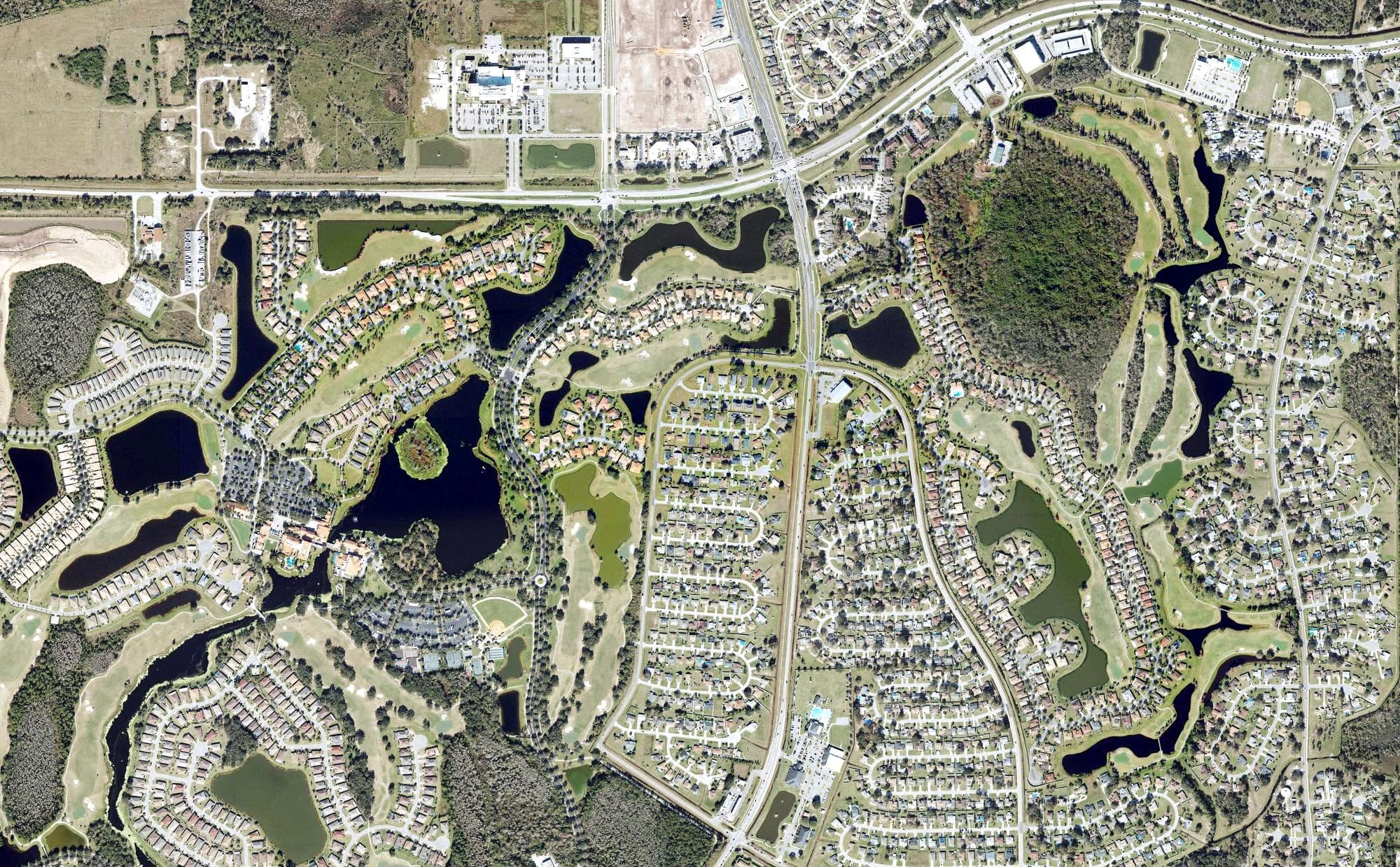 Aerial view of Stonegate Golf Club - Cypress Course, FL, with its hole routing marked