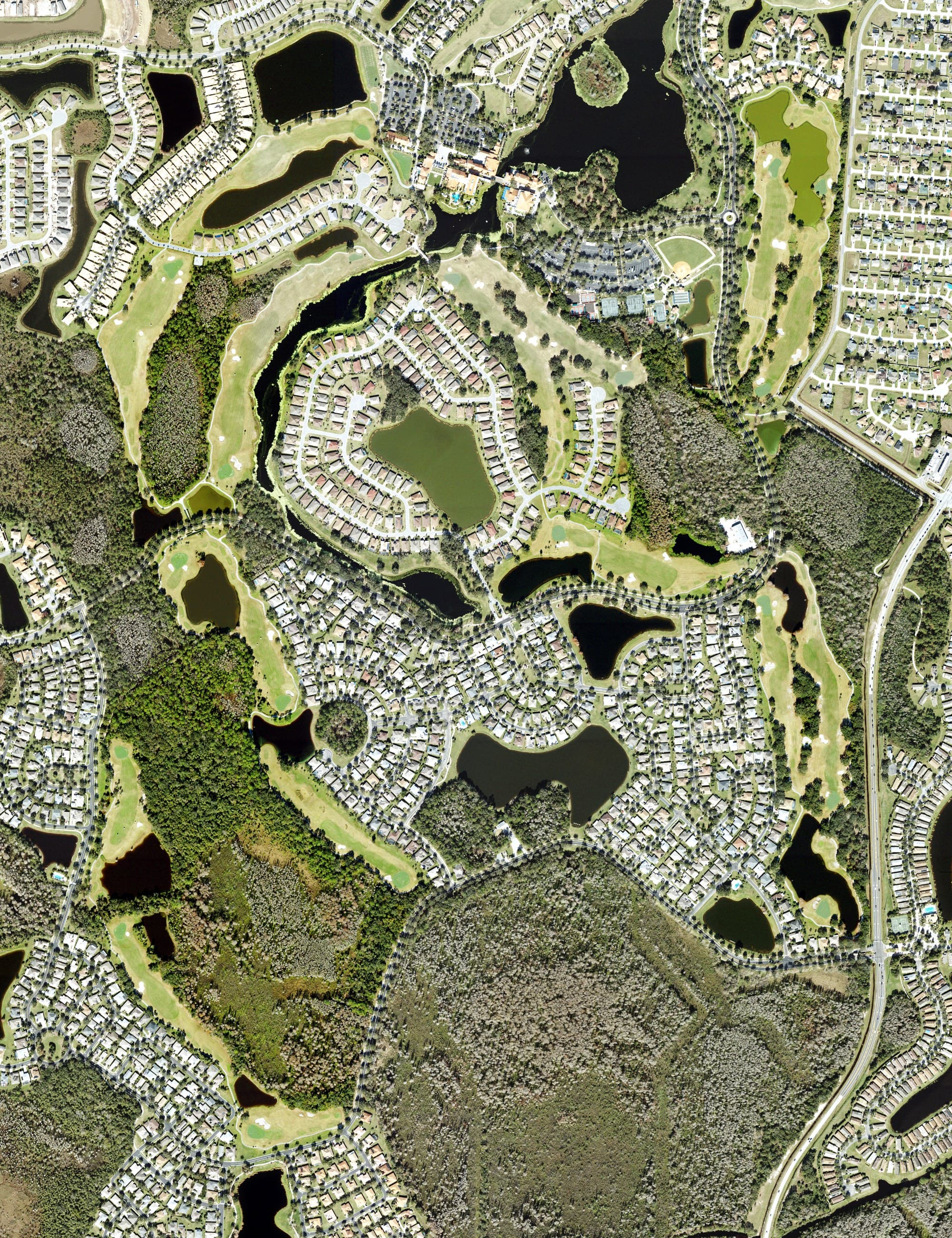 Aerial view of Stonegate Golf Club - Oaks Course, FL, with its hole routing marked