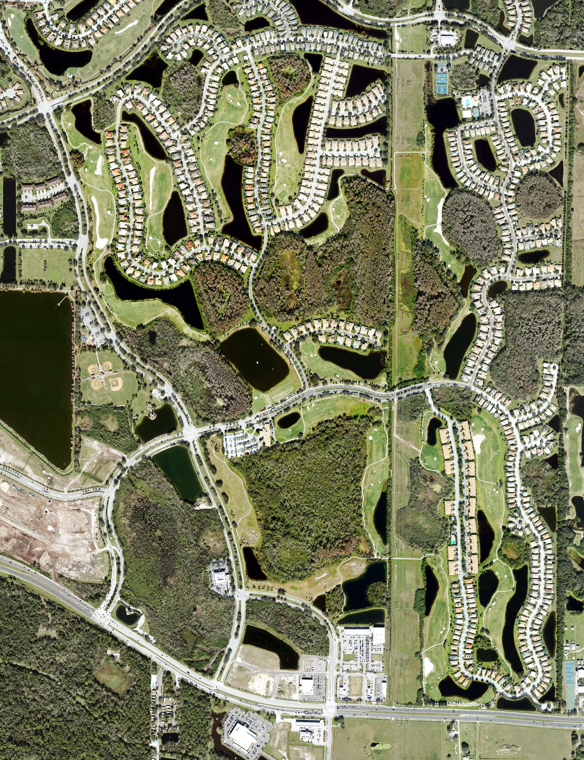 Aerial view of StoneyBrook Golf, FL, with its hole routing marked