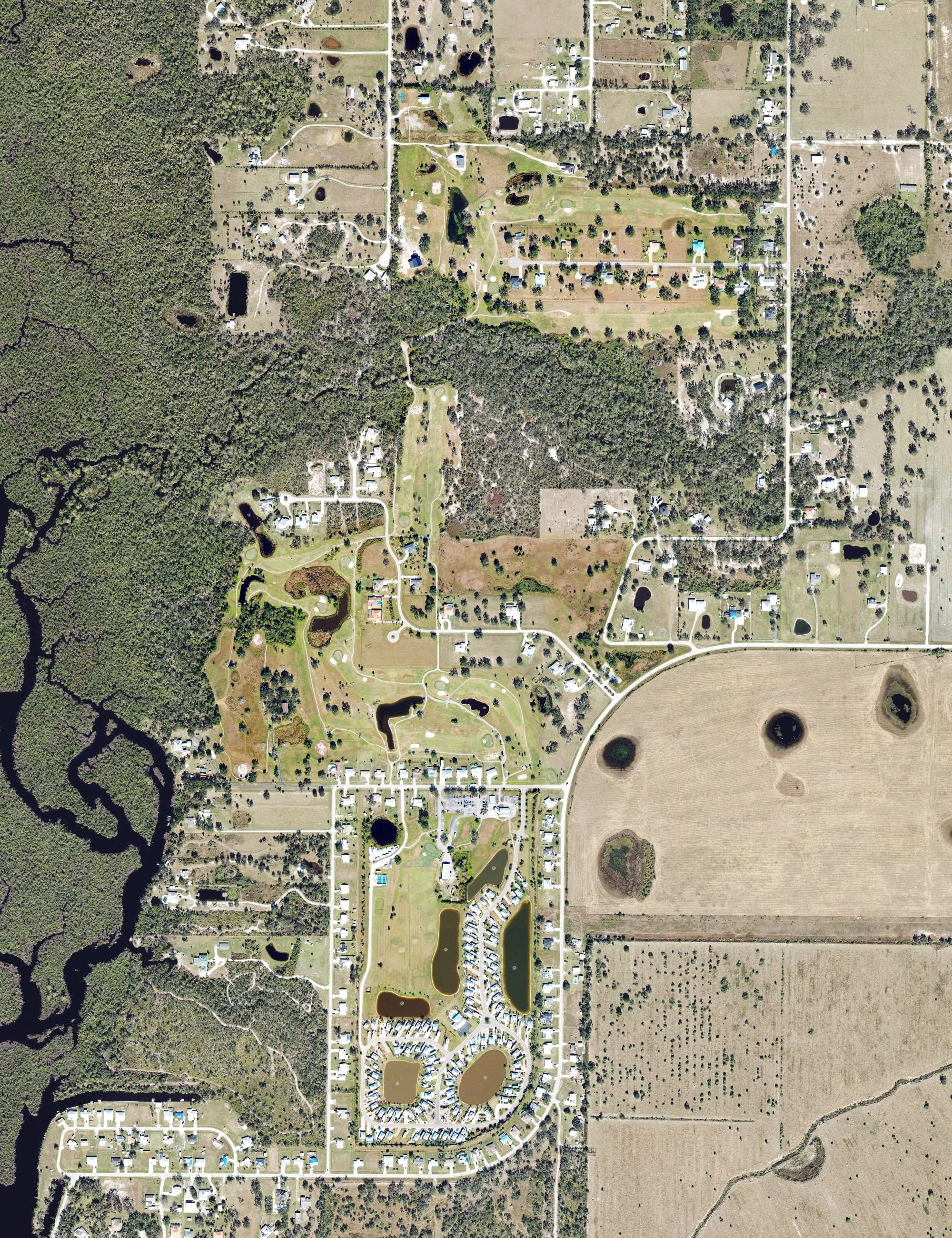 Aerial view of Sunnybreeze Golf Course, FL, with its hole routing marked