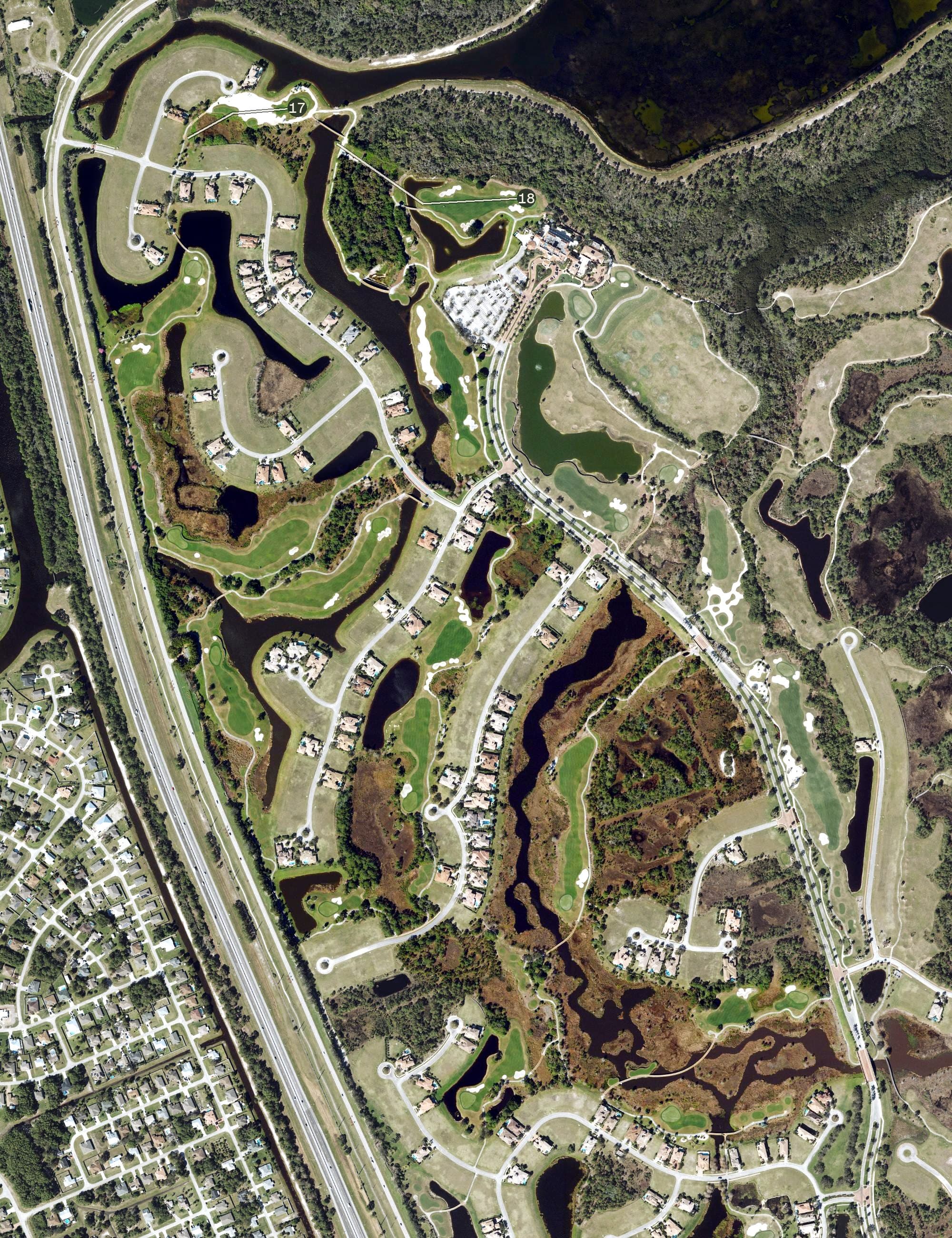 Aerial view of Tesero Golf Club, FL, with its hole routing marked