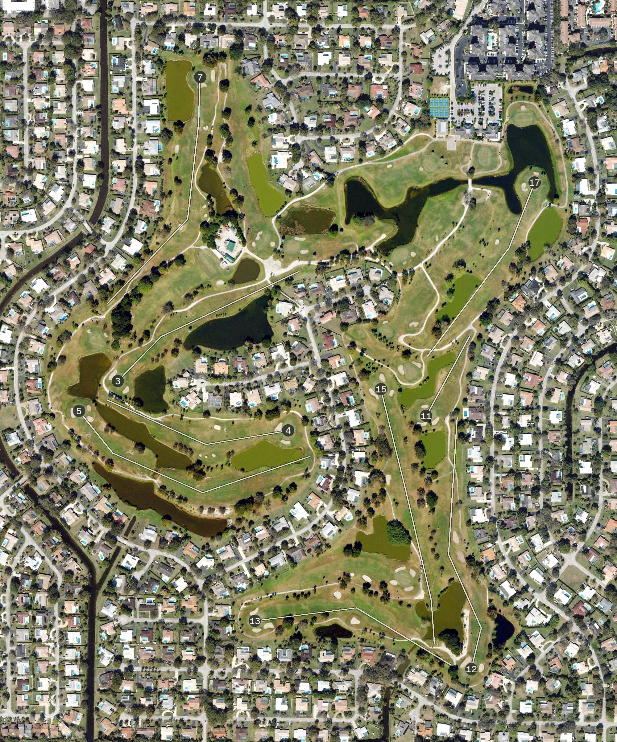 Aerial view of The Country Club of Coral Springs, FL, with its hole routing marked