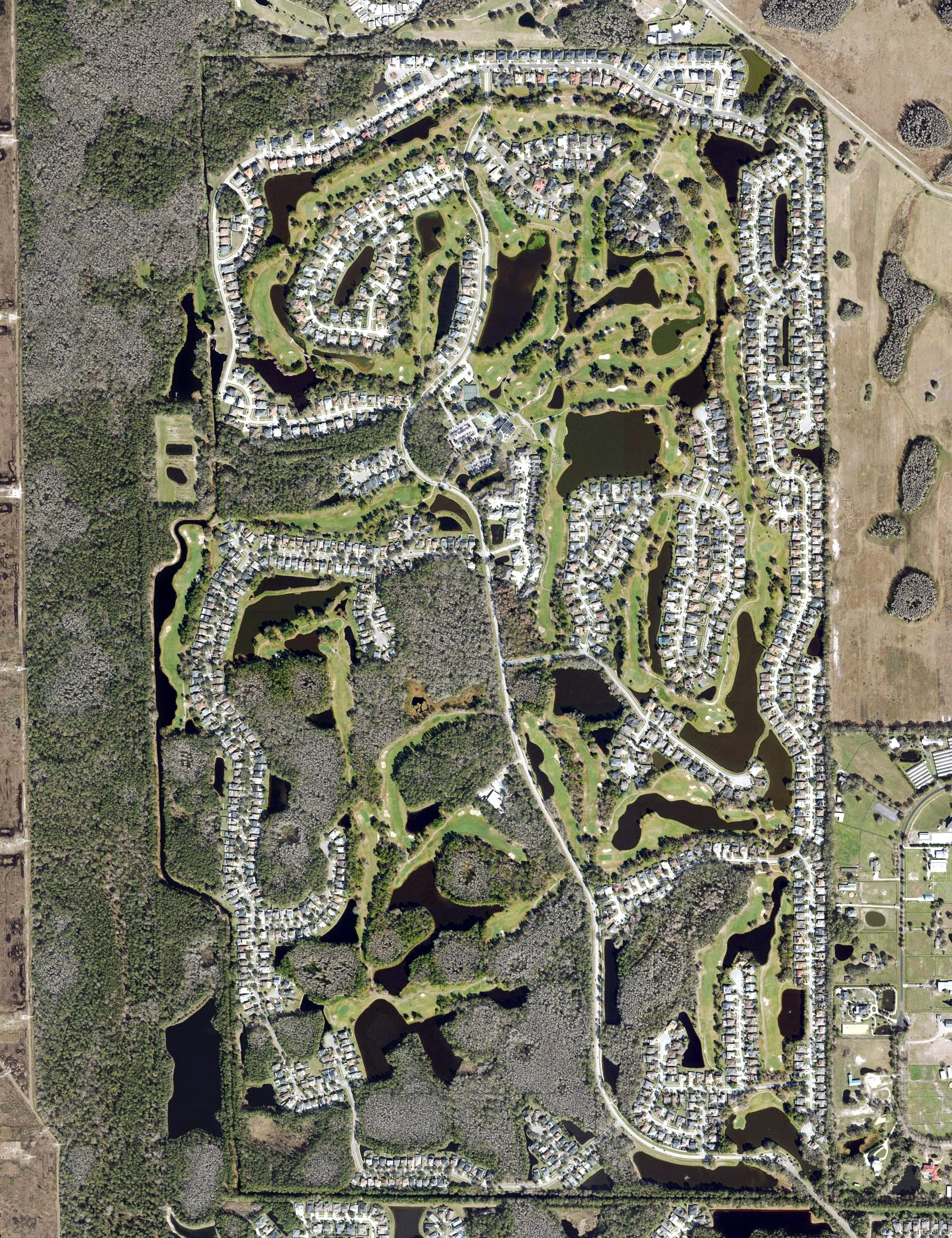 Aerial view of The Eagles Golf Club, FL, with its hole routing marked