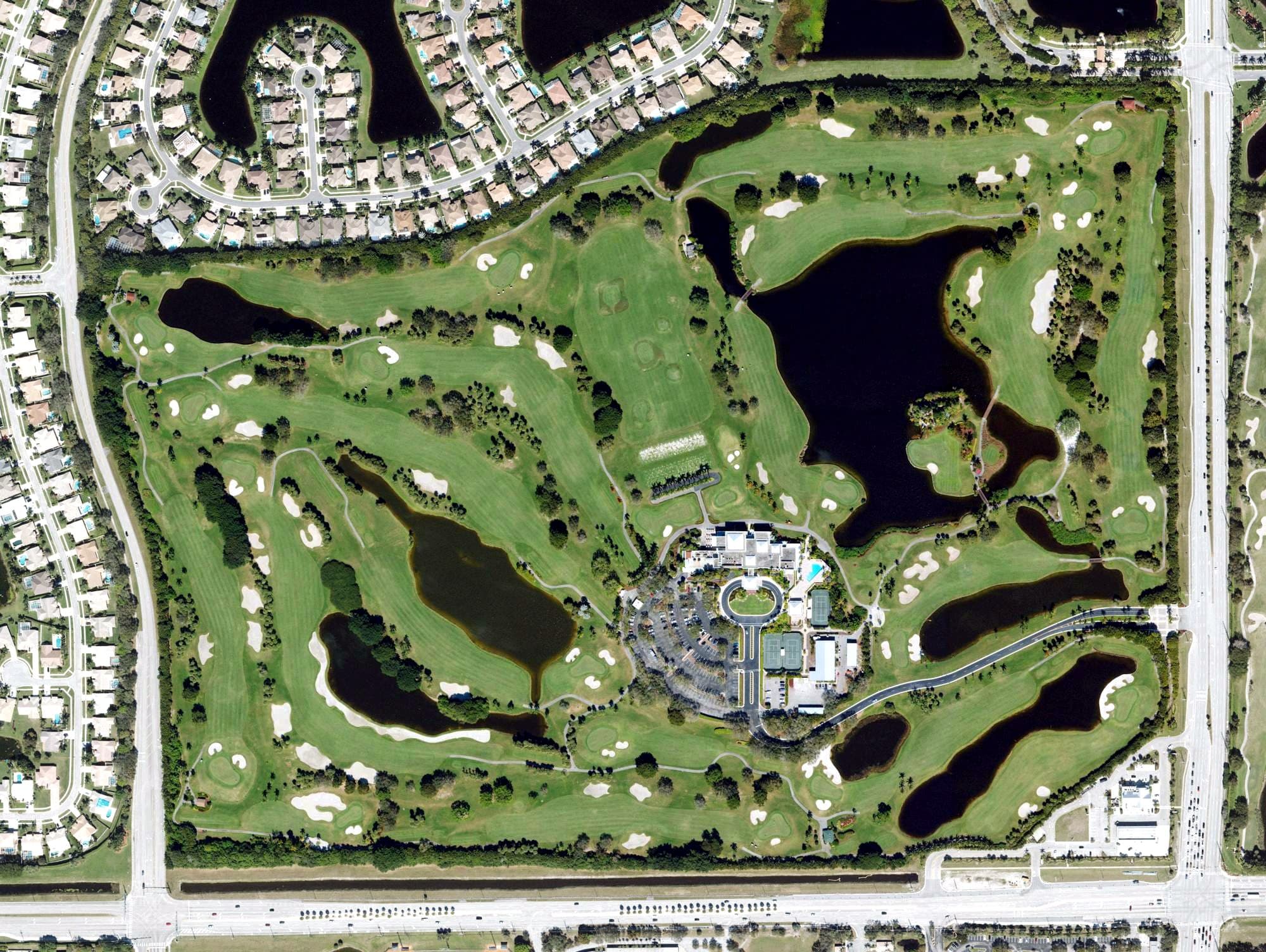 Aerial view of The Falls Club of the Palm Beaches, FL, with its hole routing marked